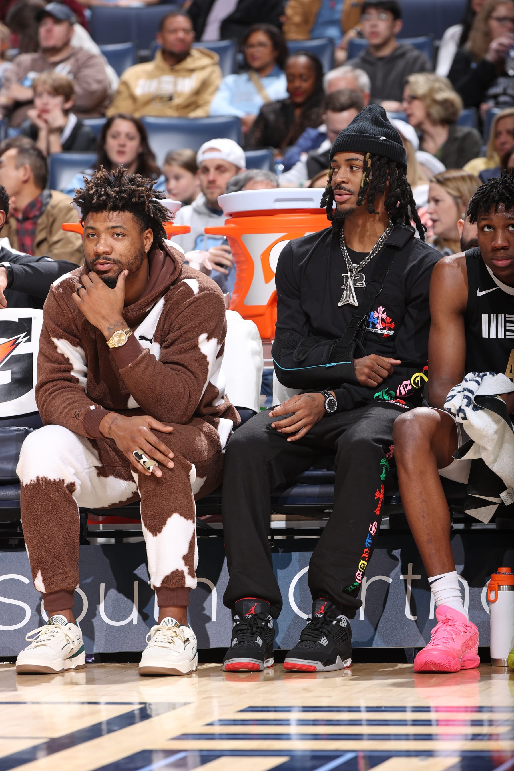 MEMPHIS, TN - JANUARY 26:  Marcus Smart #36 and Ja Morant #12 of the Memphis Grizzlies look on during the game against the Orlando Magic and on January 26, 2024 at FedExForum in Memphis, Tennessee. NOTE TO USER: User expressly acknowledges and agrees that, by downloading and or using this photograph, User is consenting to the terms and conditions of the Getty Images License Agreement. Mandatory Copyright Notice: Copyright 2024 NBAE (Photo by Joe Murphy/NBAE via Getty Images)