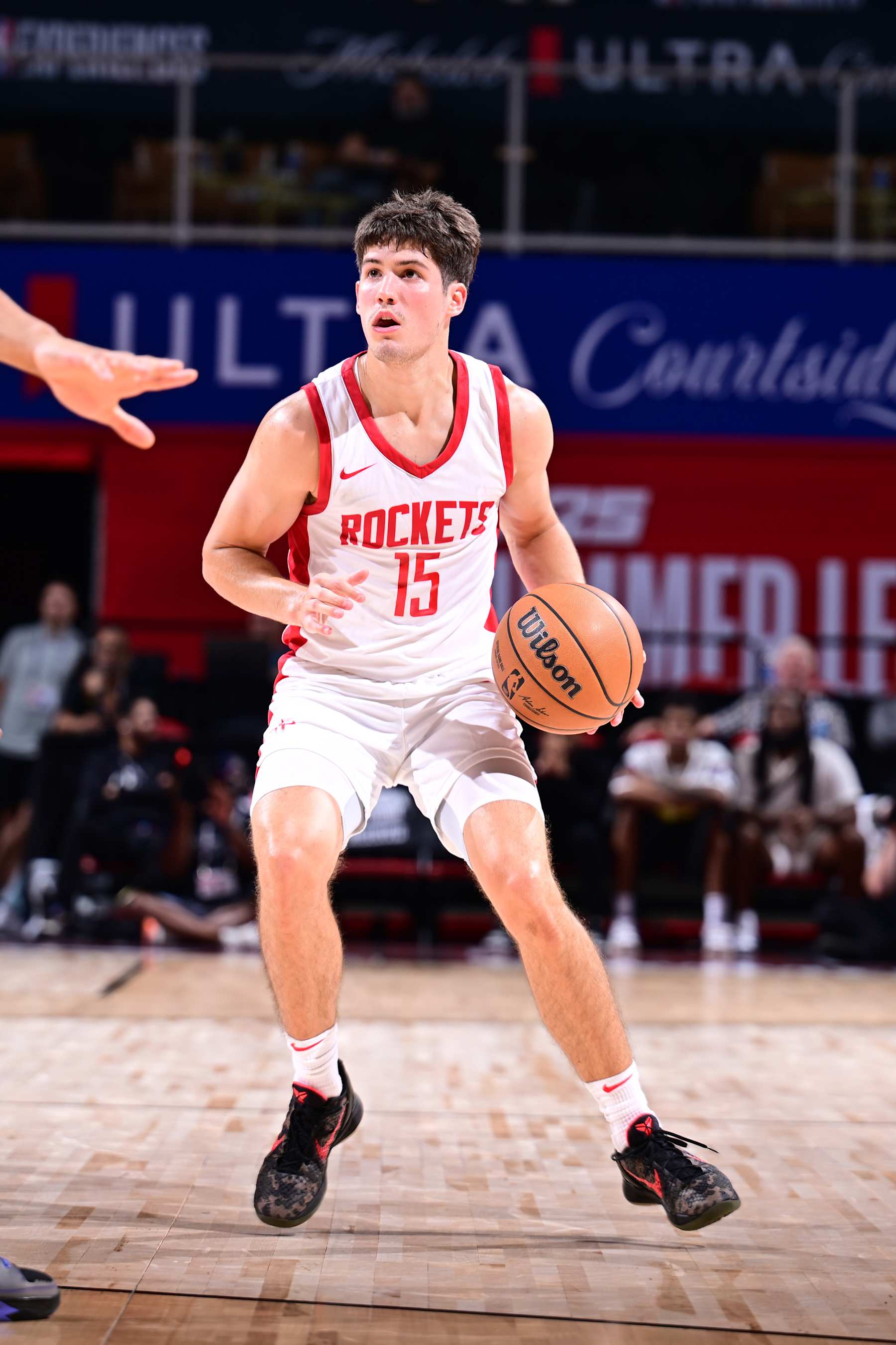 LAS VEGAS, NV - JULY 18:  Reed Sheppard #15 of the Houston Rockets handles the ball during the game  on July 18, 2024 at the Thomas & Mack Center in Las Vegas, Nevada. NOTE TO USER: User expressly acknowledges and agrees that, by downloading and or using this photograph, User is consenting to the terms and conditions of the Getty Images License Agreement. Mandatory Copyright Notice: Copyright 2024 NBAE (Photo by Adam Hagy/NBAE via Getty Images)