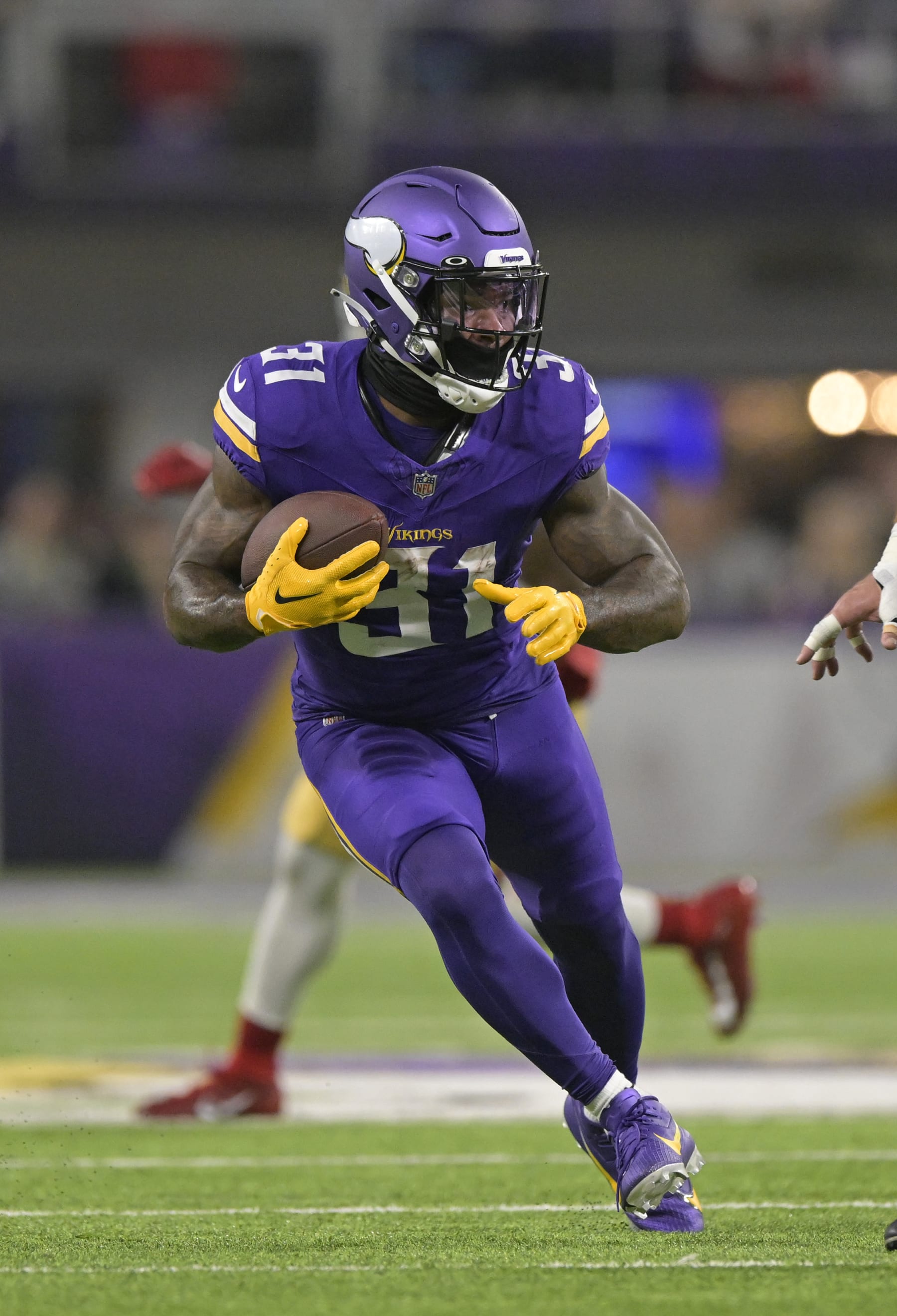 MINNEAPOLIS, MN - OCTOBER 23: Minnesota Vikings running back Cam Akers (31) runs with the ball during an NFL game between the Minnesota Vikings and San Francisco 49ers on October 23, 2023, at U.S. Bank Stadium in Minneapolis, MN.(Photo by Nick Wosika/Icon Sportswire via Getty Images)