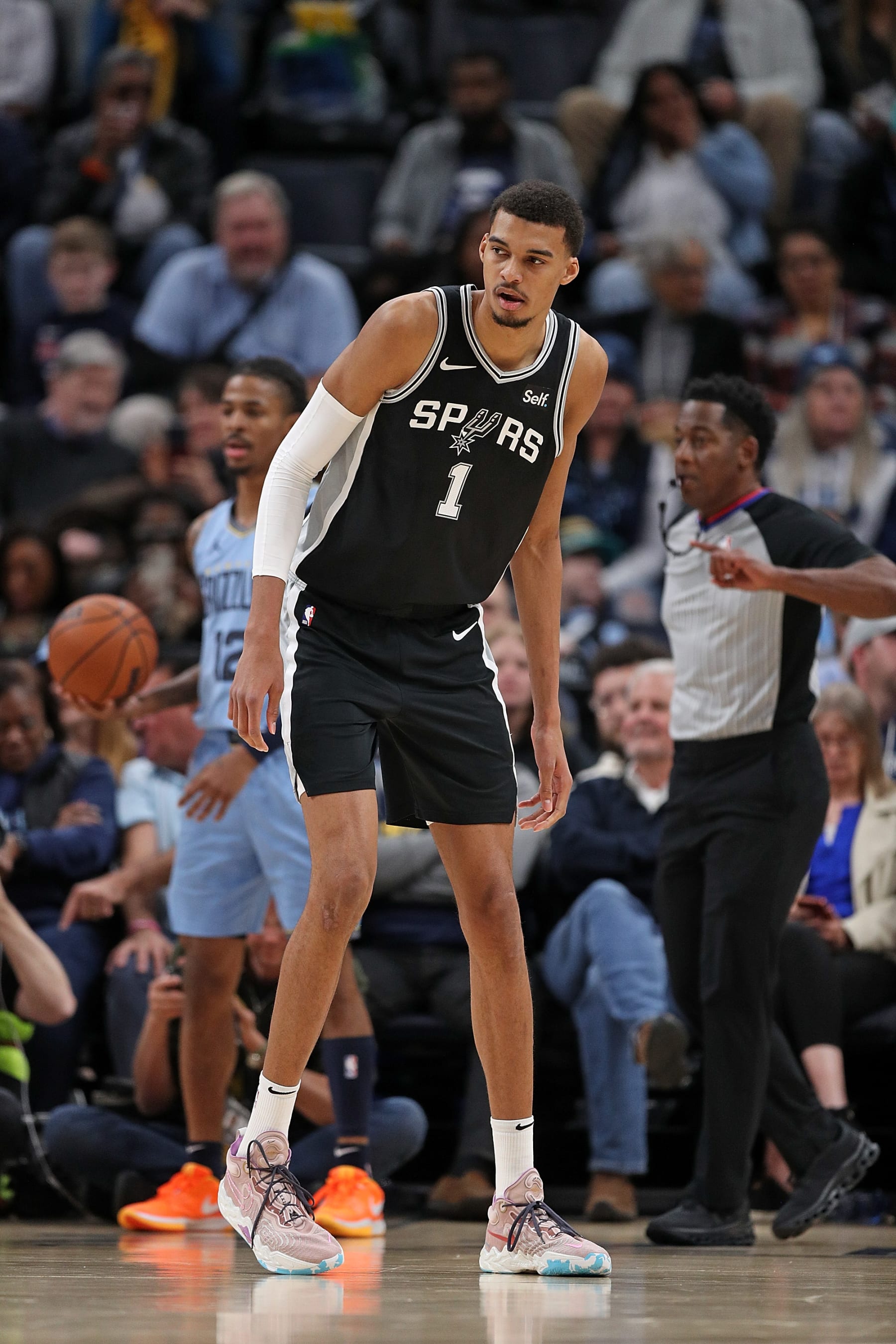 MEMPHIS, TENNESSEE - JANUARY 02: Victor Wembanyama #1 of the San Antonio Spurs looks on during the game against the Memphis Grizzlies at FedExForum on January 02, 2024 in Memphis, Tennessee. NOTE TO USER: User expressly acknowledges and agrees that, by downloading and or using this photograph, User is consenting to the terms and conditions of the Getty Images License Agreement. (Photo by Justin Ford/Getty Images)