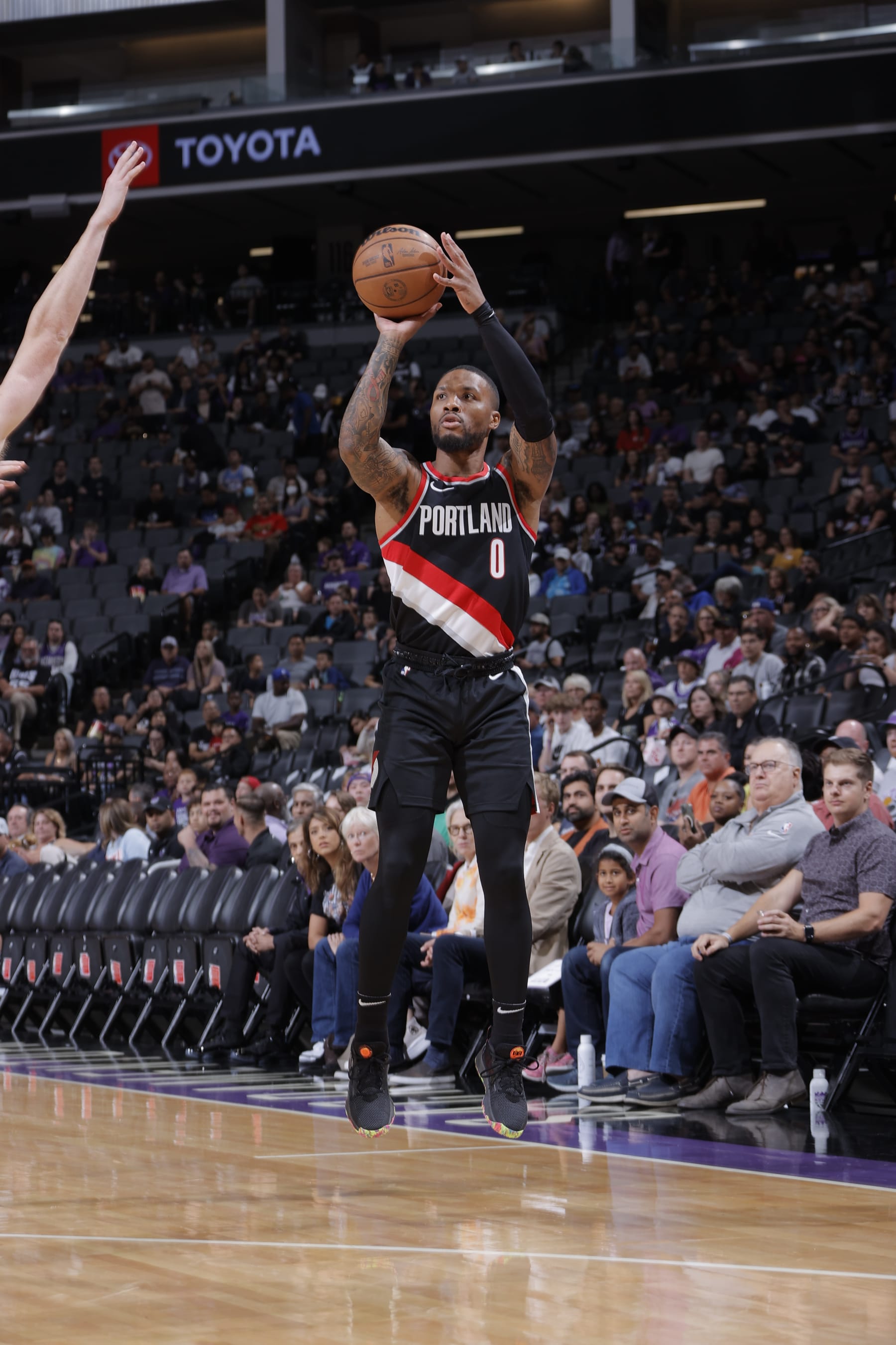 SACRAMENTO, CA - OCTOBER 9: Damian Lillard #0 of the Portland Trail Blazers shoots a three point basket against the Sacramento Kings during a preseason game on October 9, 2022 at Golden 1 Center in Sacramento, California. NOTE TO USER: User expressly acknowledges and agrees that, by downloading and or using this Photograph, user is consenting to the terms and conditions of the Getty Images License Agreement. Mandatory Copyright Notice: Copyright 2022 NBAE (Photo by Rocky Widner/NBAE via Getty Images)