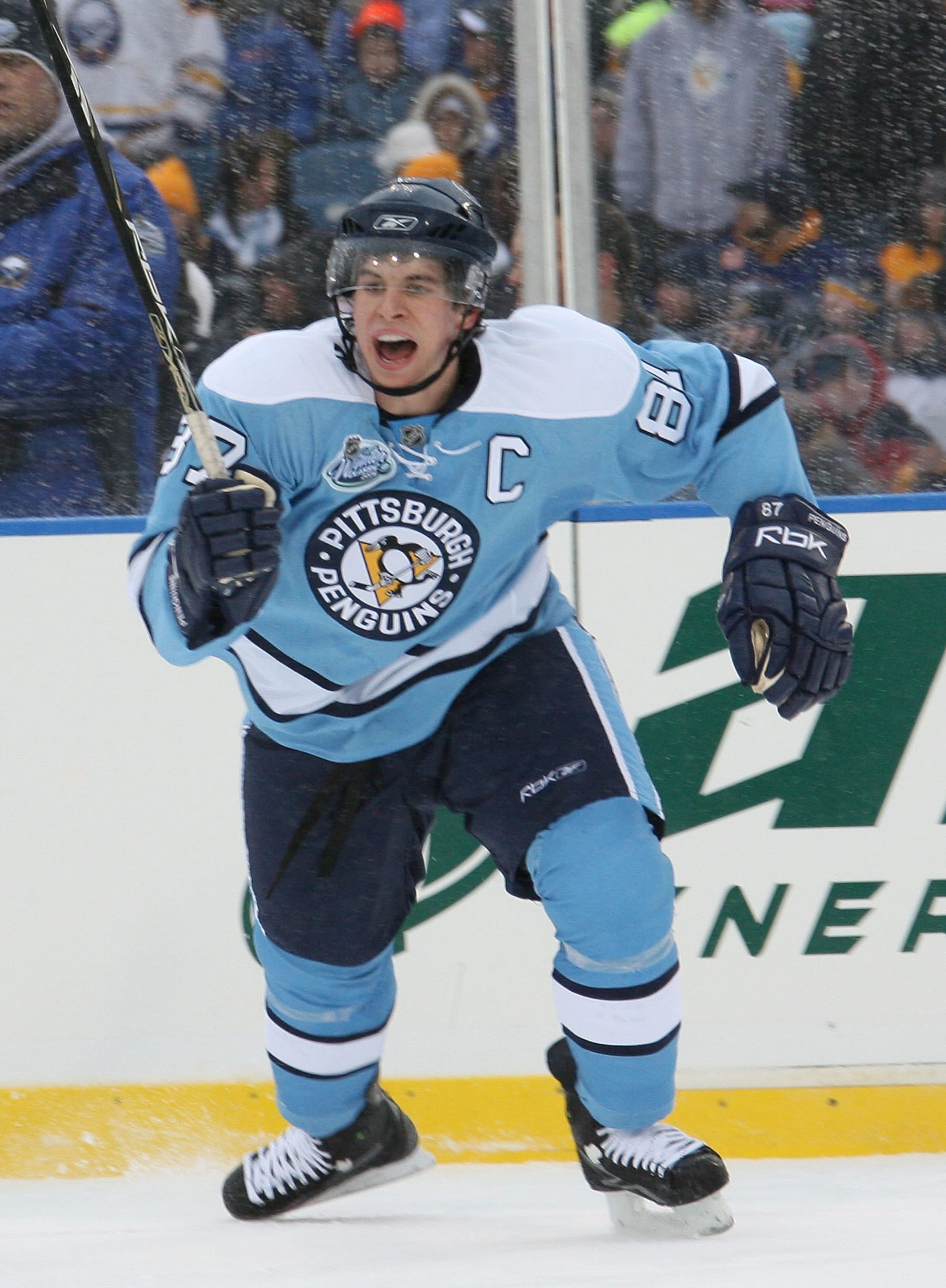 ORCHARD PARK, NY - JANUARY 01:  Sidney Crosby #87 of the Pittsburgh Penguins skates through the snowflakes during their game against  the Buffalo Sabres in the NHL Winter Classic on January 1, 2008 at Ralph Wilson Stadium in Orchard Park, New York.  (Photo by Bill Wippert/NHLI via Getty Images)