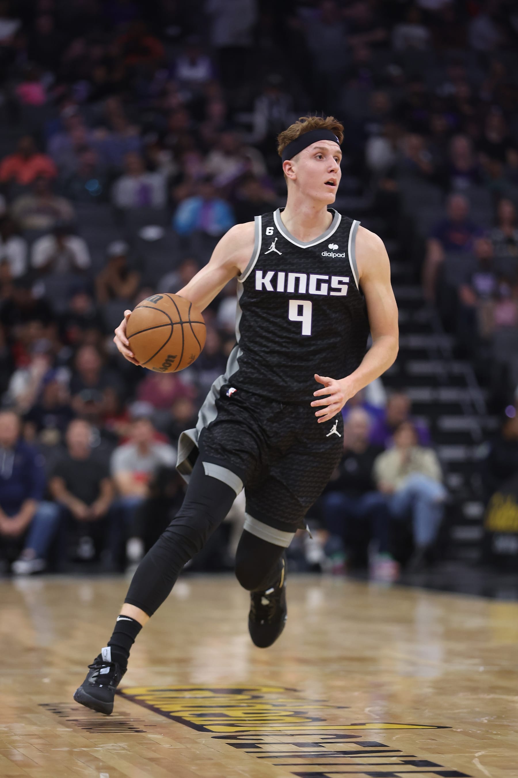 SACRAMENTO, CALIFORNIA - OCTOBER 29: Kevin Huerter #9 of the Sacramento Kings dribbles the ball up court in the second quarter against the Miami Heat at Golden 1 Center on October 29, 2022 in Sacramento, California. NOTE TO USER: User expressly acknowledges and agrees that, by downloading and/or using this photograph, User is consenting to the terms and conditions of the Getty Images License Agreement. (Photo by Lachlan Cunningham/Getty Images)