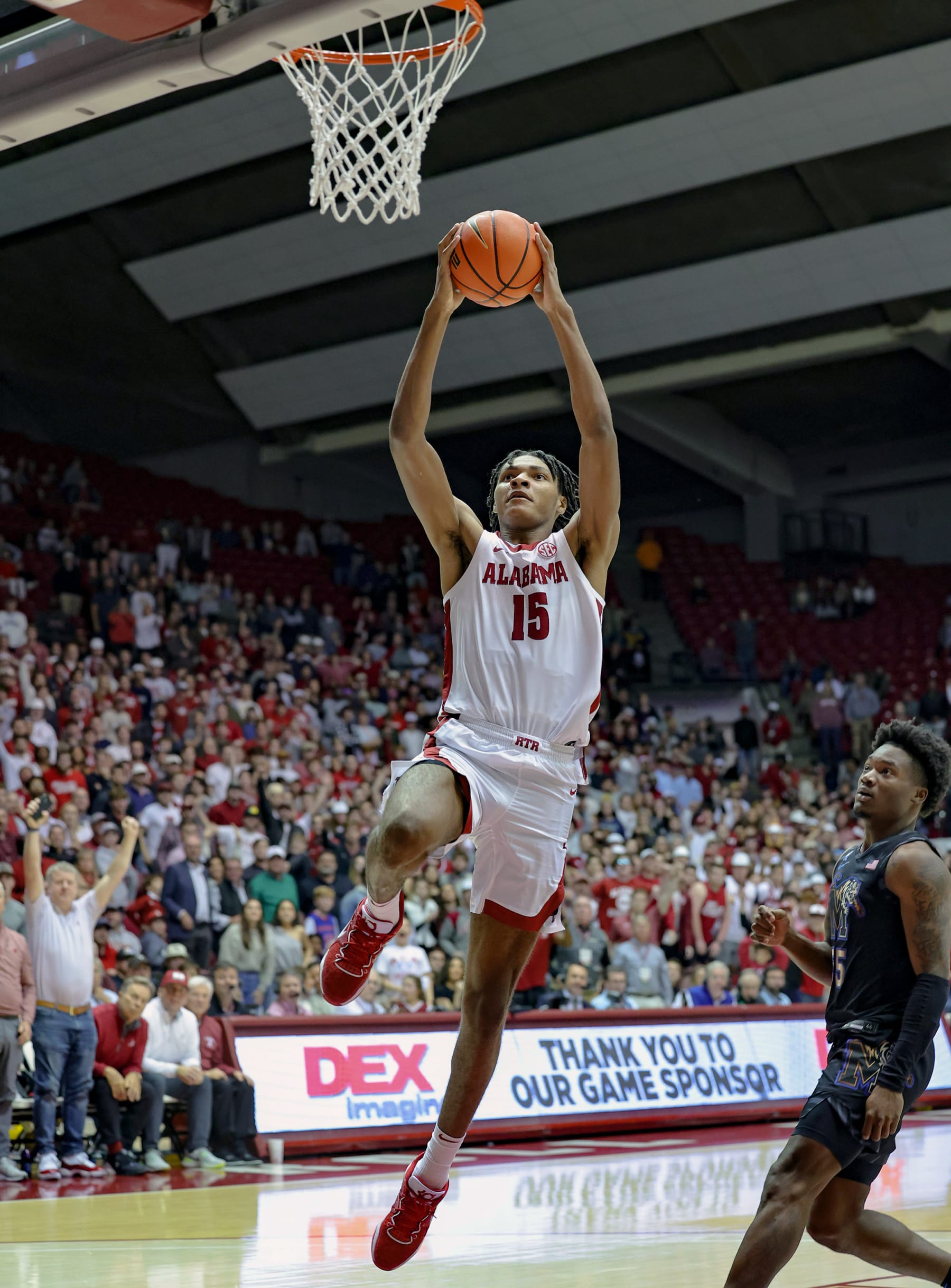 TUSCALOOSA, AL - DECEMBER 13: Noah Clowney #15 of the Alabama Crimson Tide goes up for a slam dunk during the second half against the Memphis Tigers at Coleman Coliseum on December 13, 2022 in Tuscaloosa, Alabama. (Photo by Brandon Sumrall/Getty Images)