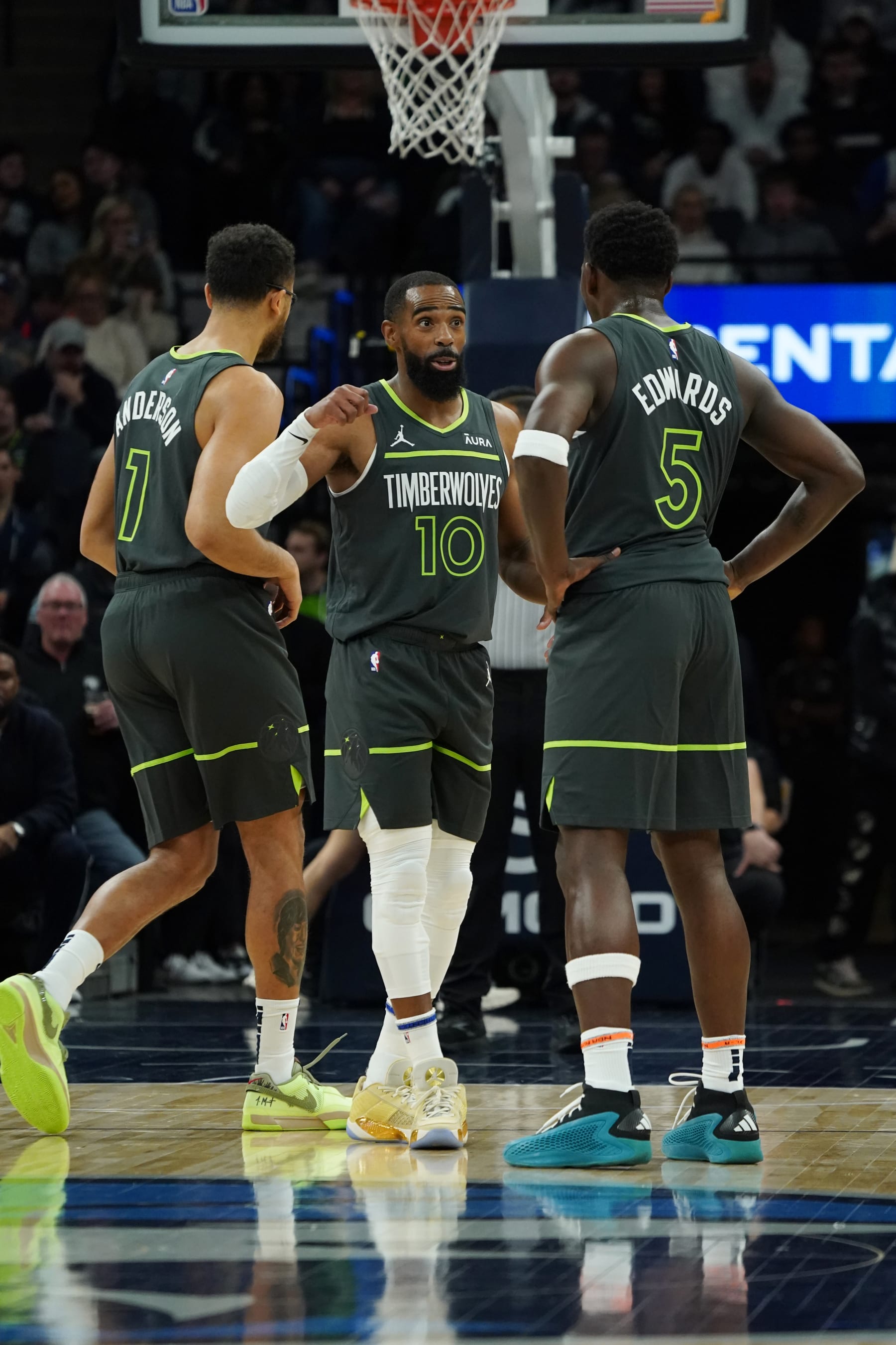 Kyle Anderson, Mike Conley and Anthony Edwards