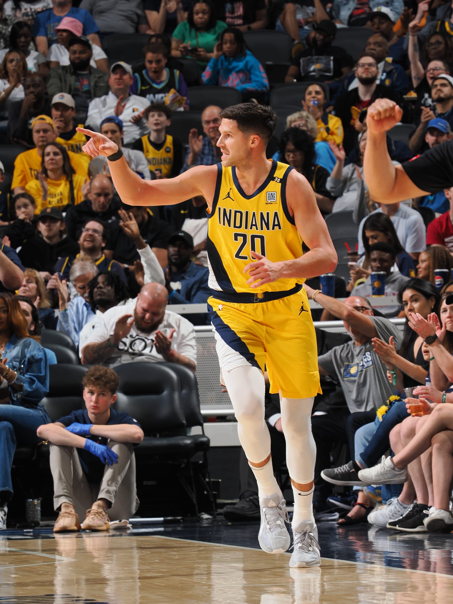 INDIANAPOLIS, IN - APRIL 14: Doug McDermott #20 of the Indiana Pacers celebrates during the game against the Atlanta Hawks on April 14, 2024 at Gainbridge Fieldhouse in Indianapolis, Indiana. NOTE TO USER: User expressly acknowledges and agrees that, by downloading and or using this Photograph, user is consenting to the terms and conditions of the Getty Images License Agreement. Mandatory Copyright Notice: Copyright 2024 NBAE (Photo by Ron Hoskins/NBAE via Getty Images)