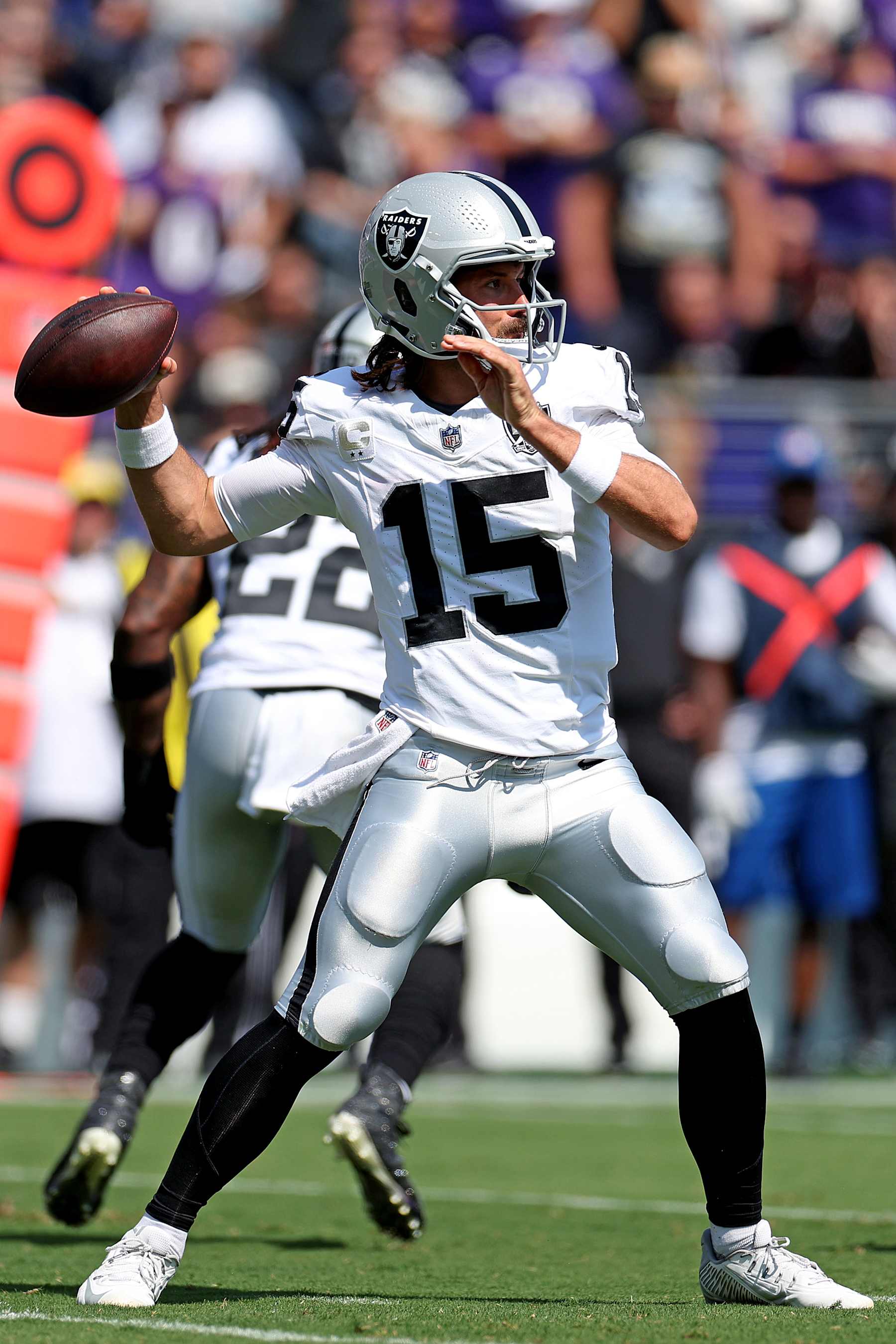 BALTIMORE, MARYLAND - SEPTEMBER 15: Gardner Minshew II #15 of the Las Vegas Raiders throws a pass during the first quarter at M&T Bank Stadium on September 15, 2024 in Baltimore, Maryland. (Photo by Rob Carr/Getty Images)