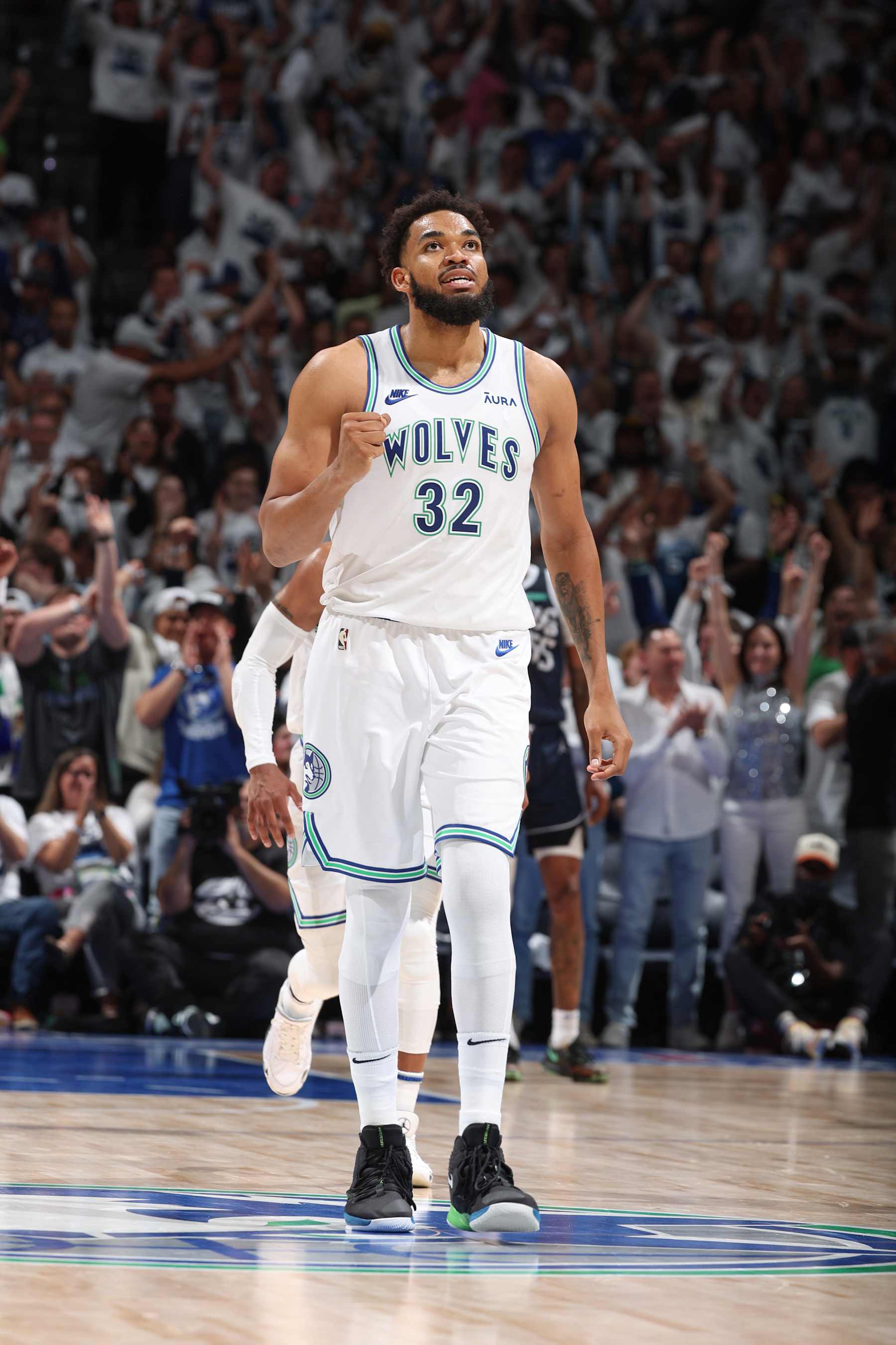 MINNEAPOLIS, MN -  MAY 22:  Karl-Anthony Towns #32 of the Minnesota Timberwolves looks on during the game against the Dallas Mavericks during Game 1 of the Western Conference Finals of the 2024 NBA Playoffs on May 22, 2024 at Target Center in Minneapolis, Minnesota. NOTE TO USER: User expressly acknowledges and agrees that, by downloading and or using this Photograph, user is consenting to the terms and conditions of the Getty Images License Agreement. Mandatory Copyright Notice: Copyright 2024 NBAE (Photo by David Sherman/NBAE via Getty Images)