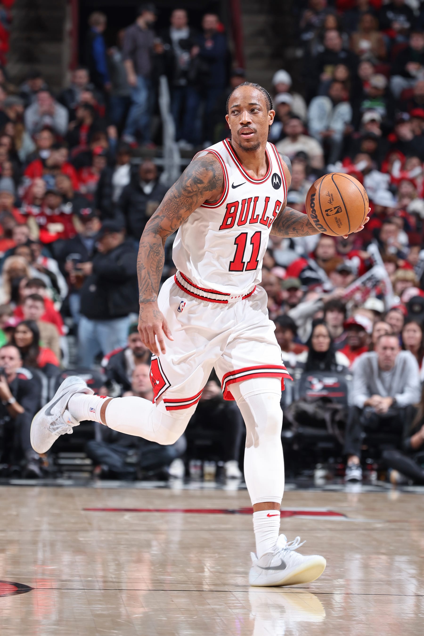CHICAGO, IL - FEBRUARY 6: DeMar DeRozan #11 of the Chicago Bulls brings the ball up court during the game against the Minnesota Timberwolves on February 6, 2024 at United Center in Chicago, Illinois. NOTE TO USER: User expressly acknowledges and agrees that, by downloading and or using this photograph, User is consenting to the terms and conditions of the Getty Images License Agreement. Mandatory Copyright Notice: Copyright 2024 NBAE (Photo by Jeff Haynes/NBAE via Getty Images)