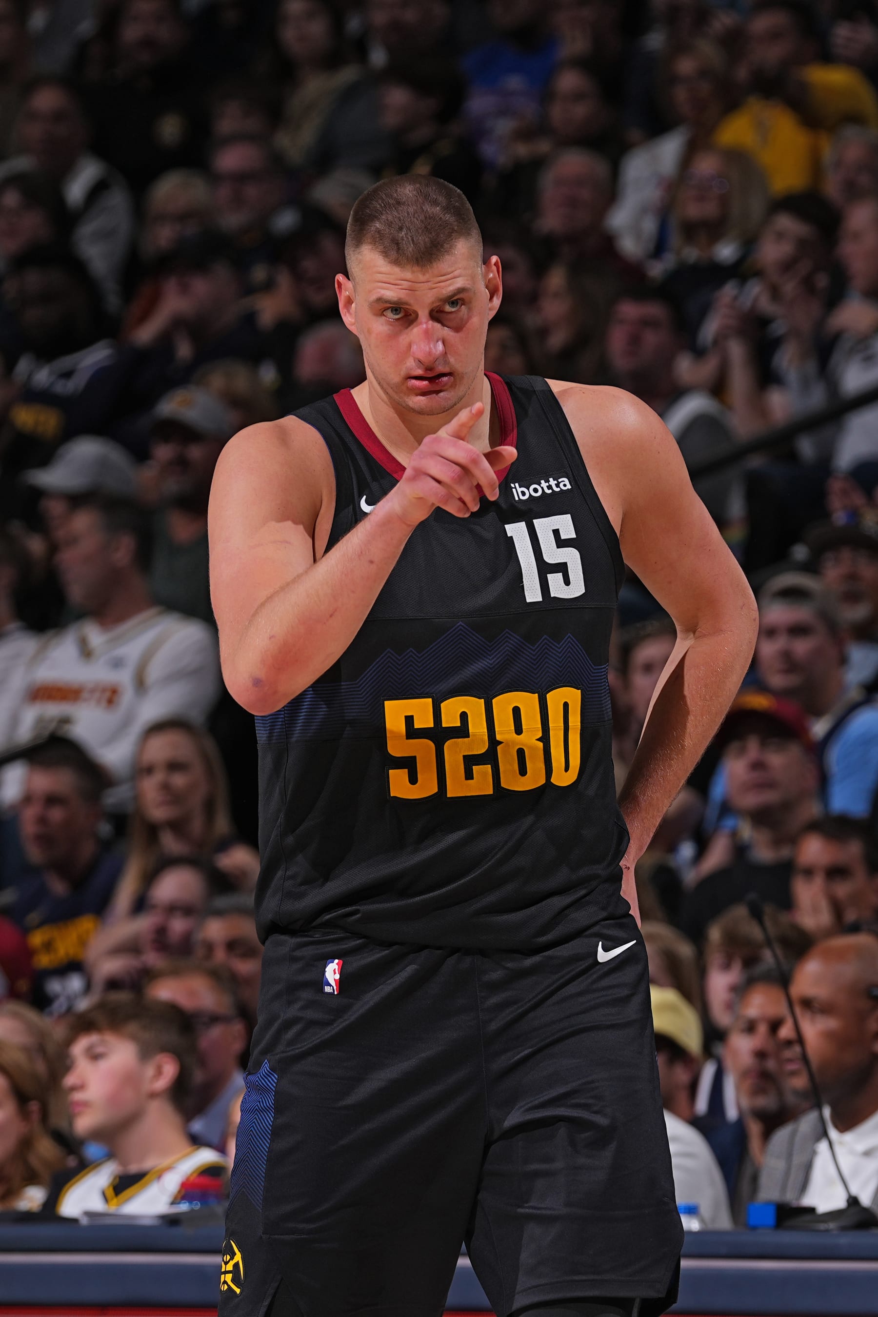 DENVER, CO - APRIL 22: Nikola Jokic #15 of the Denver Nuggets looks on during the game against the Los Angeles Lakers on April 22, 2024 at the Ball Arena in Denver, Colorado. NOTE TO USER: User expressly acknowledges and agrees that, by downloading and/or using this Photograph, user is consenting to the terms and conditions of the Getty Images License Agreement. Mandatory Copyright Notice: Copyright 2024 NBAE (Photo by Bart Young/NBAE via Getty Images)