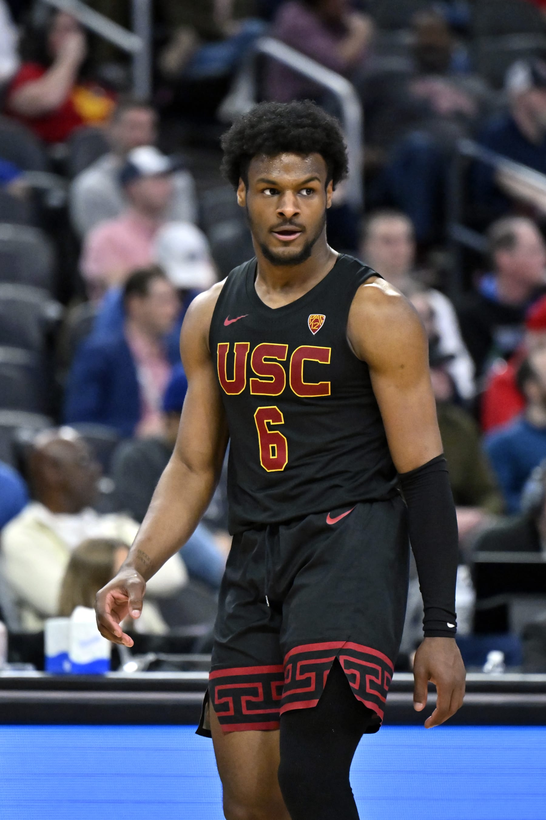 LAS VEGAS, NEVADA - MARCH 14: Bronny James #6 of the USC Trojans looks on in the second half of a quarterfinal game against the Arizona Wildcats during the Pac-12 Conference basketball tournament at T-Mobile Arena on March 14, 2024 in Las Vegas, Nevada. The Wildcats defeated the Trojans 70-49. (Photo by David Becker/Getty Images)
