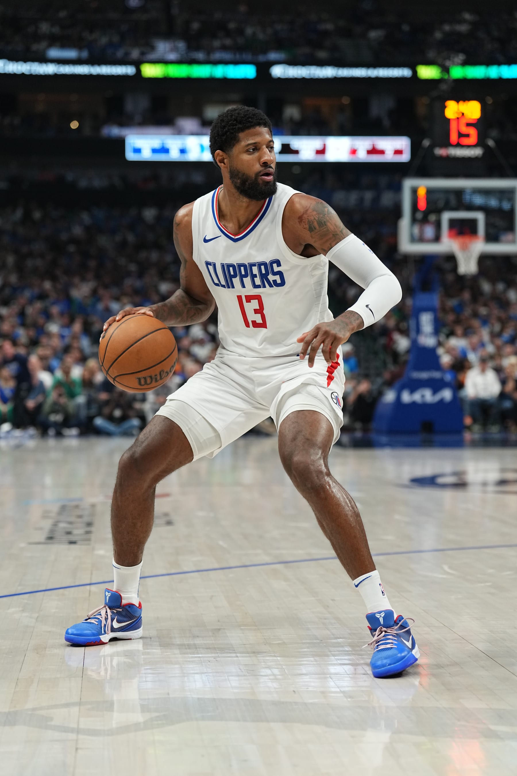 DALLAS, TX - APRIL 28: Paul George #13 of the LA Clippers handles the ball during the game against the Dallas Mavericks during Round 1 Game 4 of the 2024NBA Playoffs on April 28, 2024 at the American Airlines Center in Dallas, Texas. NOTE TO USER: User expressly acknowledges and agrees that, by downloading and or using this photograph, User is consenting to the terms and conditions of the Getty Images License Agreement. Mandatory Copyright Notice: Copyright 2024 NBAE (Photo by Glenn James/NBAE via Getty Images) DALLAS, TX - APRIL 28: Paul George #13 of the LA Clippers handles the ball during the game against the Dallas Mavericks during Round 1 Game 4 of the 2024NBA Playoffs on April 28, 2024 at the American Airlines Center in Dallas, Texas. NOTE TO USER: User expressly acknowledges and agrees that, by downloading and or using this photograph, User is consenting to the terms and conditions of the Getty Images License Agreement. Mandatory Copyright Notice: Copyright 2024 NBAE (Photo by Glenn James/NBAE via Getty Images)