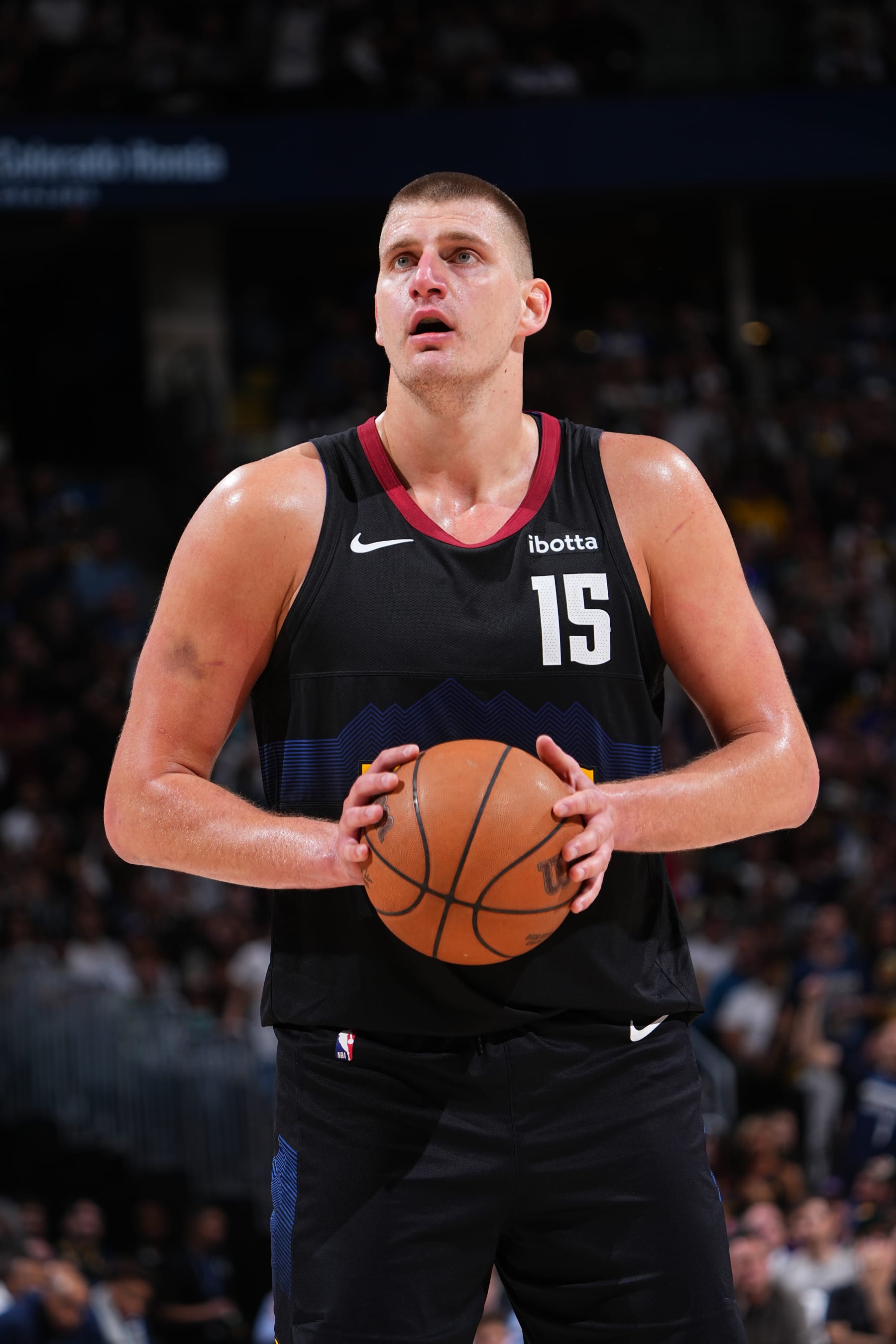 DENVER, CO - MAY 14: Nikola Jokic #15 of the Denver Nuggets prepares to shoot a free throw against the Minnesota Timberwolves during Round 2 Game 5 of the of the 2024 NBA Playoffs on May 14, 2024 at the Ball Arena in Denver, Colorado. NOTE TO USER: User expressly acknowledges and agrees that, by downloading and/or using this Photograph, user is consenting to the terms and conditions of the Getty Images License Agreement. Mandatory Copyright Notice: Copyright 2024 NBAE (Photo by Garrett Ellwood/NBAE via Getty Images)