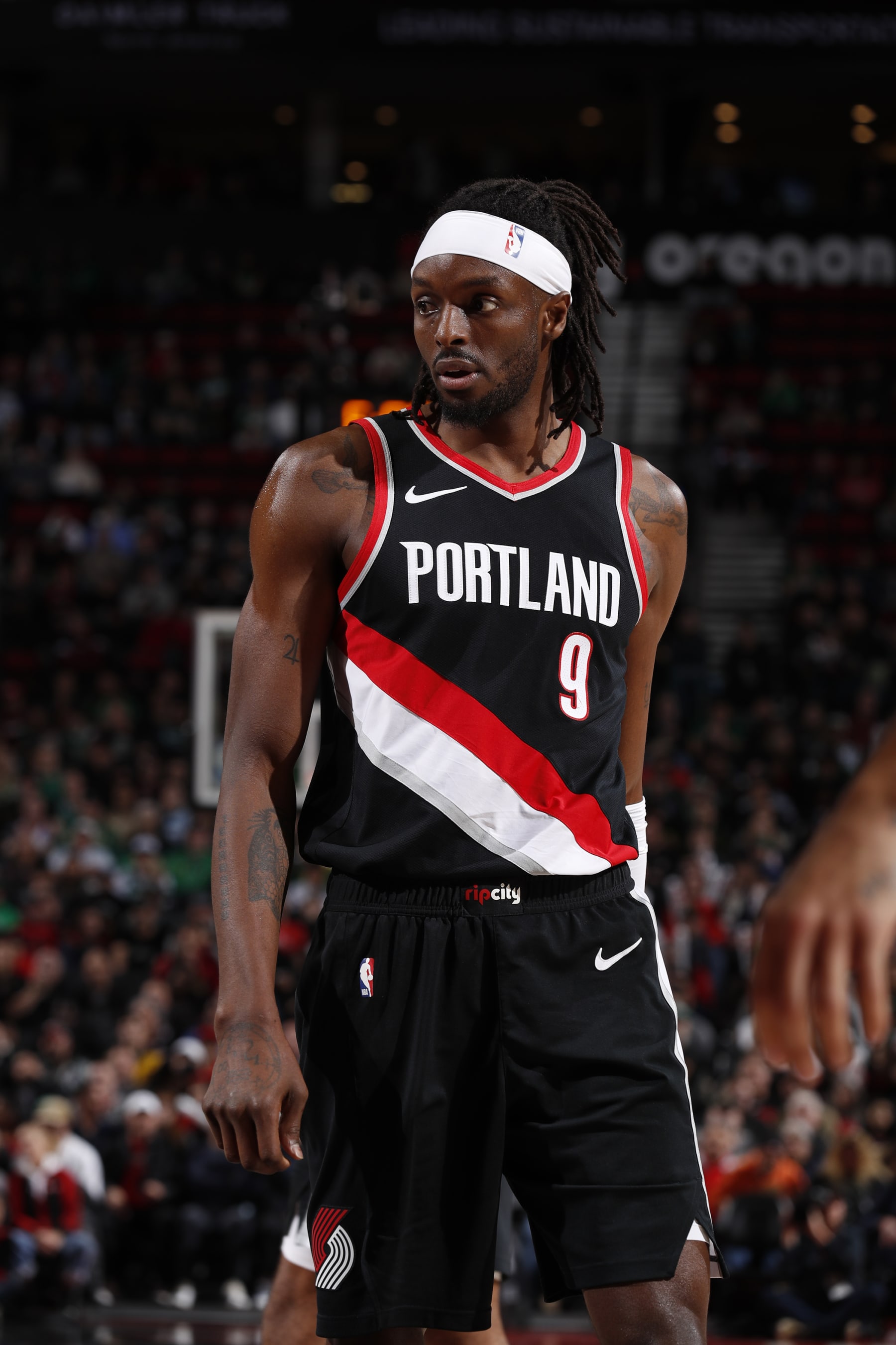 PORTLAND, OR - MARCH 11: Jerami Grant #9 of the Portland Trail Blazers looks on during the game against the Boston Celtics on March 11, 2024 at the Moda Center Arena in Portland, Oregon. NOTE TO USER: User expressly acknowledges and agrees that, by downloading and or using this photograph, user is consenting to the terms and conditions of the Getty Images License Agreement. Mandatory Copyright Notice: Copyright 2024 NBAE (Photo by Cameron Browne/NBAE via Getty Images)