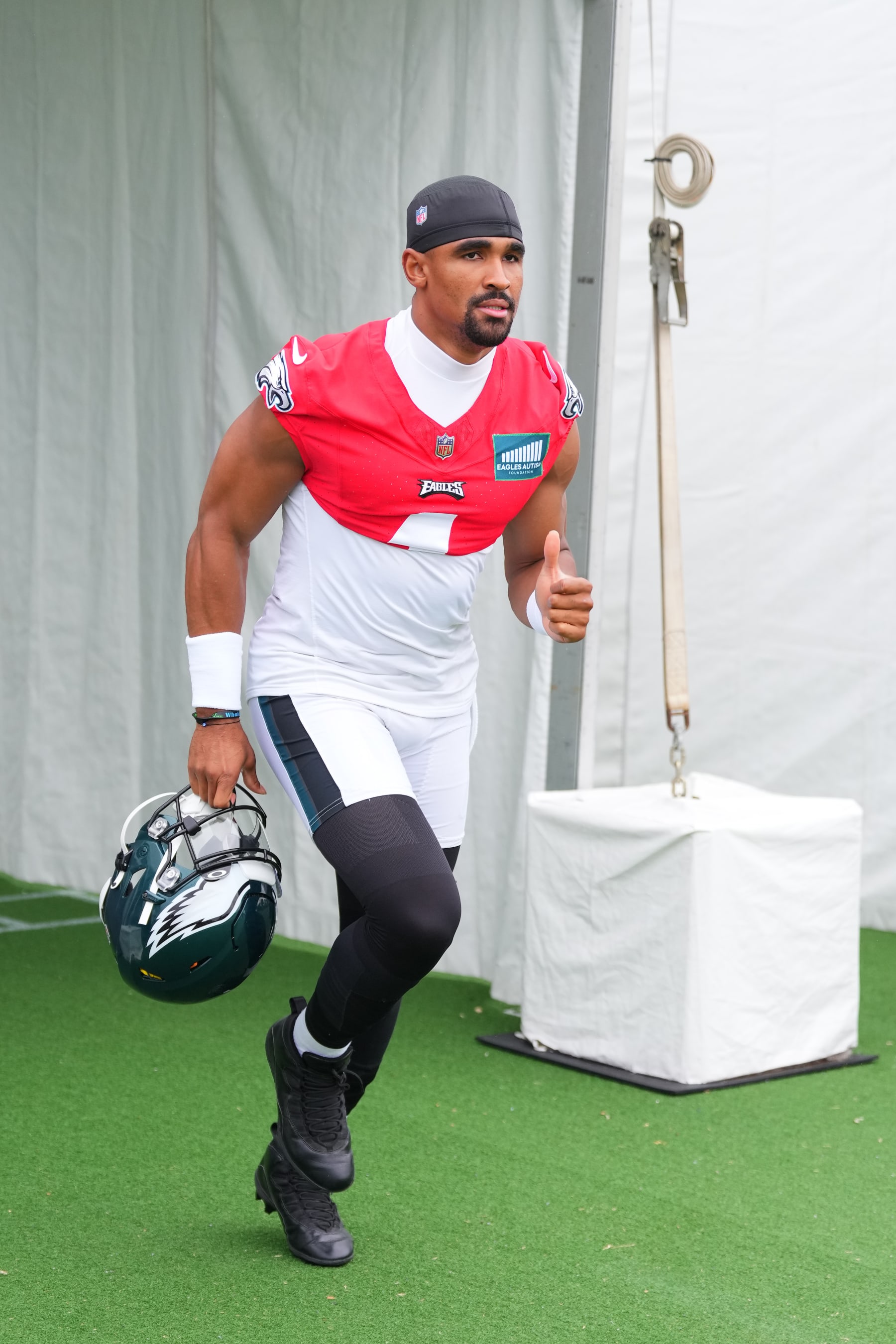 PHILADELPHIA, PENNSYLVANIA - AUGUST 10: Jalen Hurts #1 of the Philadelphia Eagles runs onto the field during Training Camp at the NovaCare Complex on August 10, 2023 in Philadelphia, Pennsylvania. (Photo by Mitchell Leff/Getty Images)