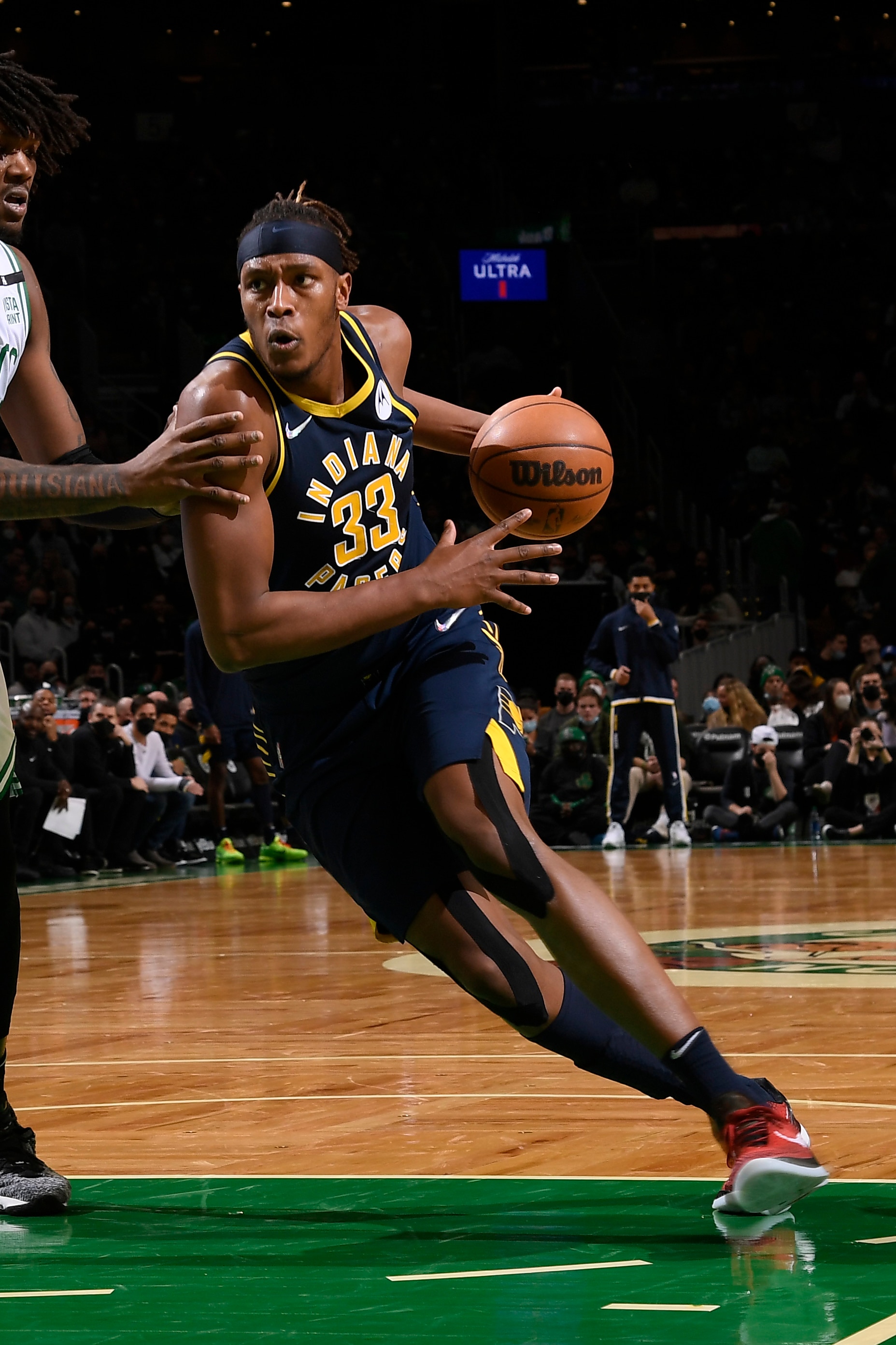 BOSTON, MA - JANUARY 10: Myles Turner #33 of the Indiana Pacers dribbles the ball during the game against the Boston Celtics on January 10, 2022 at the TD Garden in Boston, Massachusetts.  NOTE TO USER: User expressly acknowledges and agrees that, by downloading and or using this photograph, User is consenting to the terms and conditions of the Getty Images License Agreement. Mandatory Copyright Notice: Copyright 2022 NBAE  (Photo by Brian Babineau/NBAE via Getty Images)