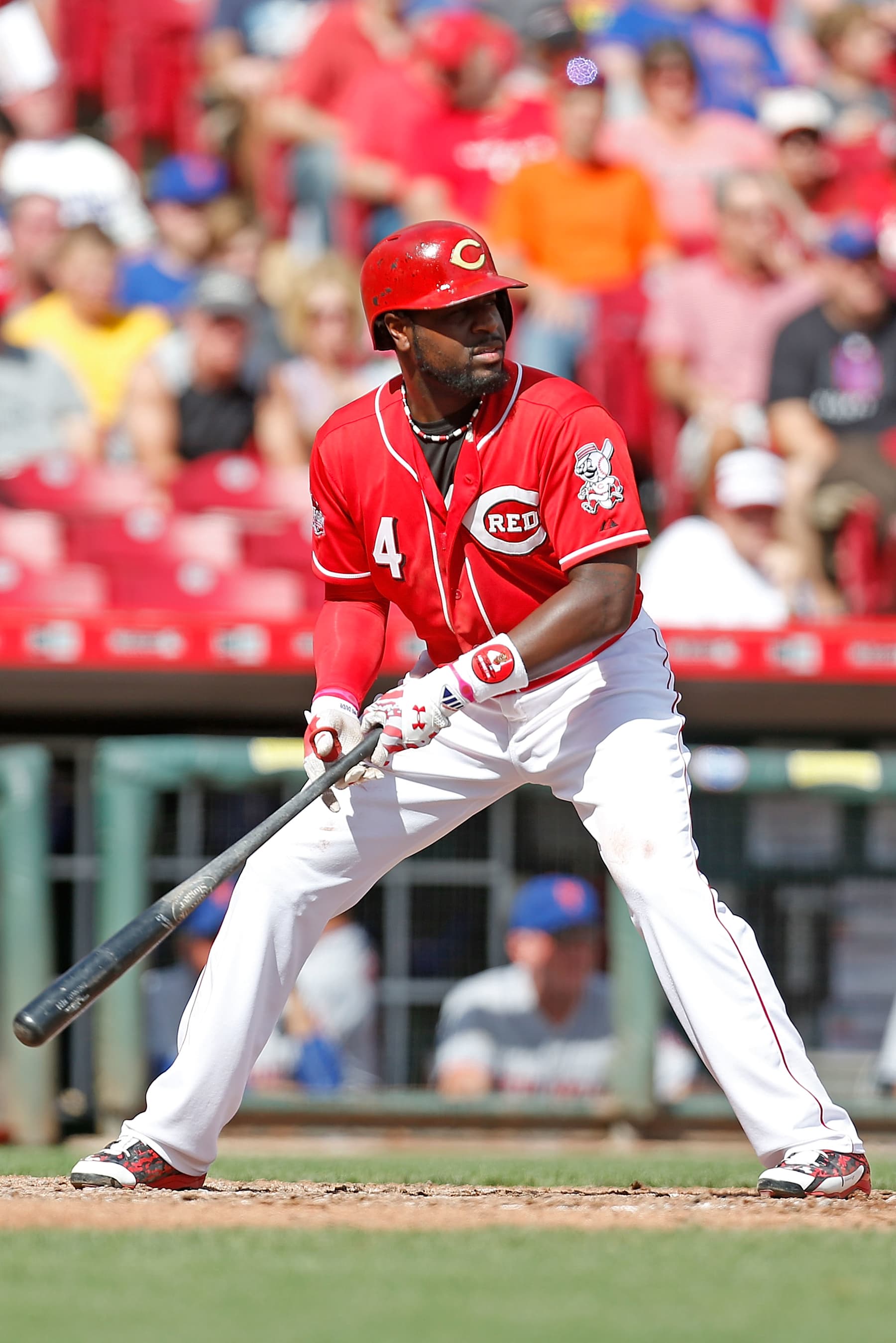 CINCINNATI, OH - SEPTEMBER 27:  Brandon Phillips #4 of the Cincinnati Reds takes an at bat during the game against the New York Mets at Great American Ball Park on September 27, 2015 in Cincinnati, Ohio. New York defeated Cincinnati 8-1. (Photo by Kirk Irwin/Getty Images)