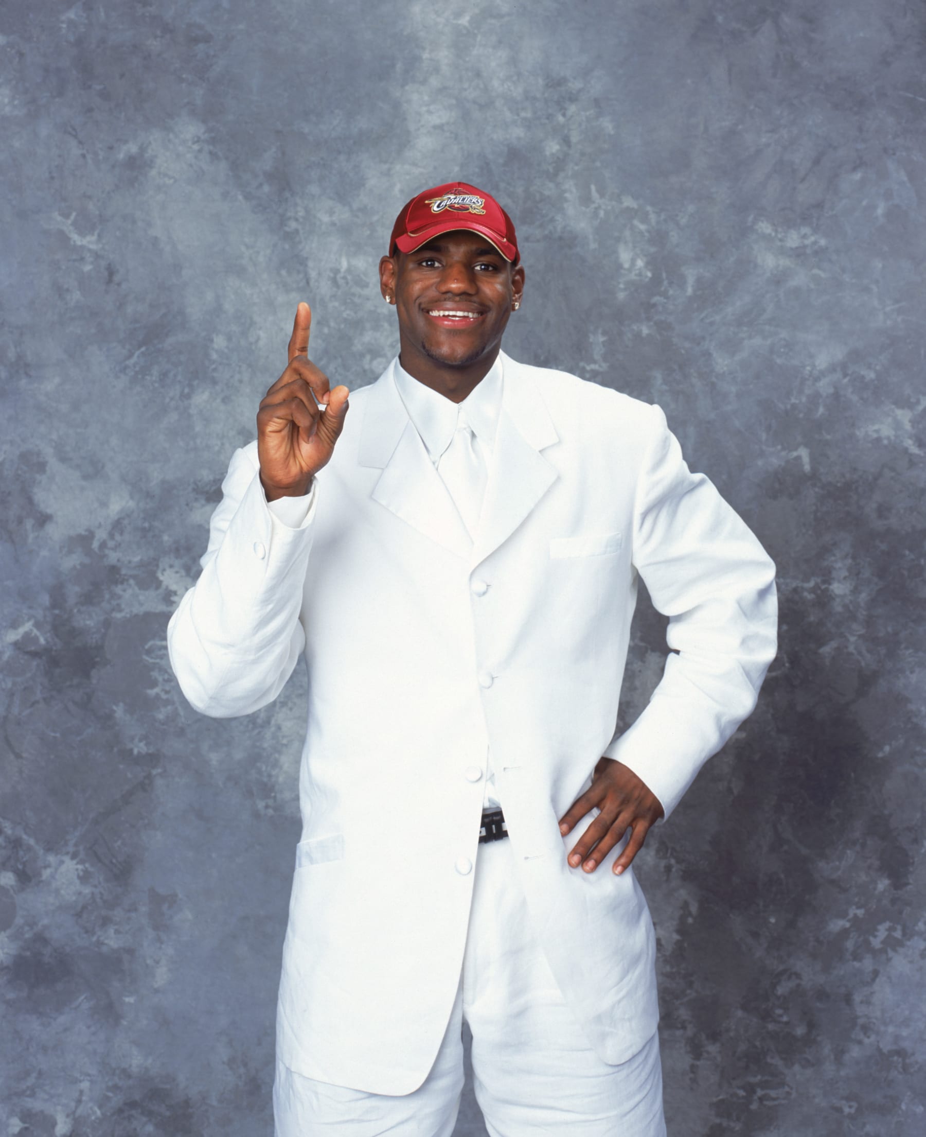 NEW YORK - JUNE 26:  LeBron James of the Cleveland Cavaliers poses during the 2003/2004 NBA Draft Portrait at Paramount Theatre Madison Square Garden on June 26, 2003 in New York, New York. NOTE TO USER: User expressly acknowledges and agrees that, by downloading and/or using this Photograph, User is consenting to the terms and conditions of the Getty Images License Agreement. Mandatory copyright notice:  Copyright 2003 NBAE  (Photo by: Jennifer Pottheiser/NBAE via Getty Images)