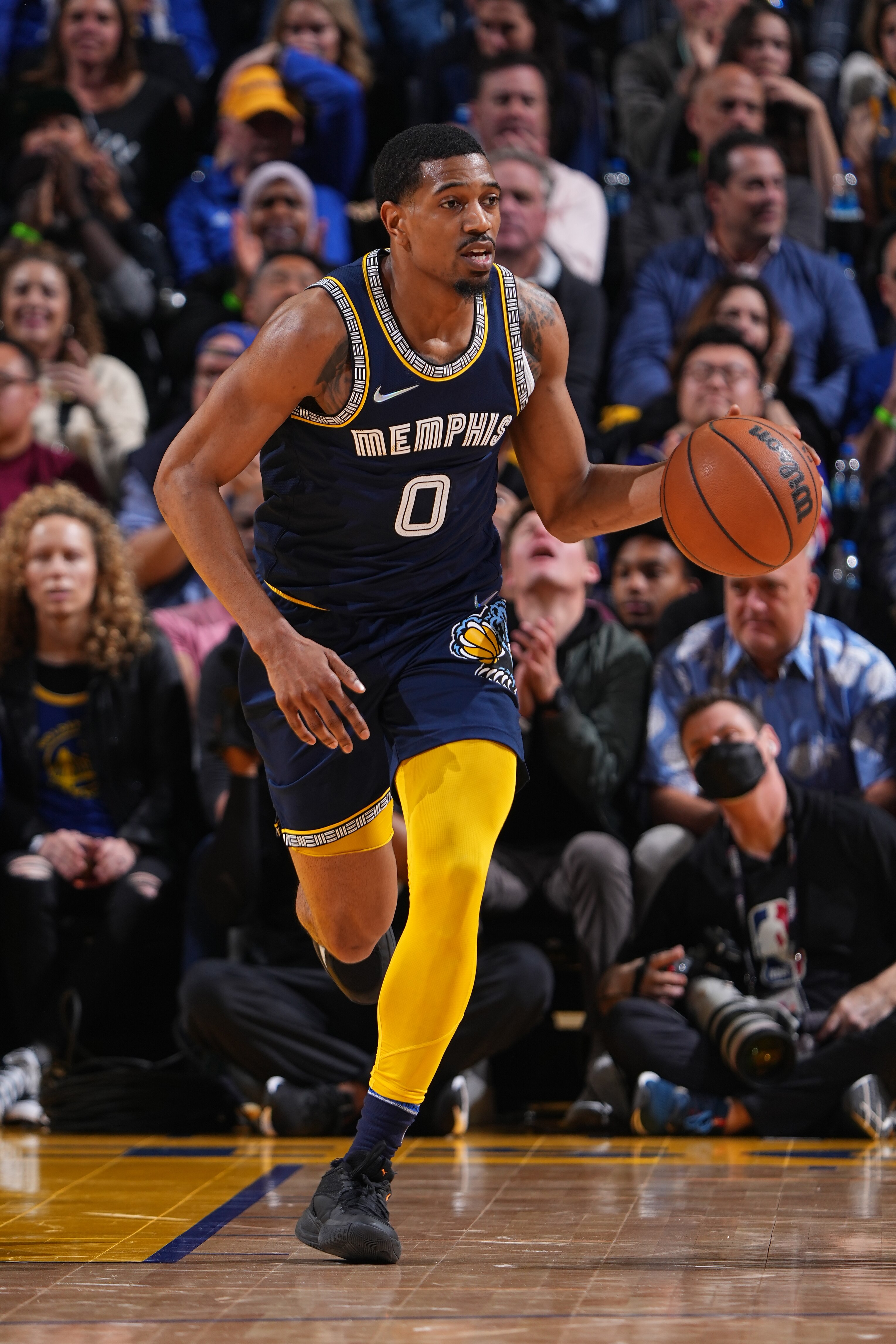 SAN FRANCISCO, CA - MAY 9: De'Anthony Melton #0 of the Memphis Grizzlies dribbles the ball against the Golden State Warriors during Game 4 of the 2022 NBA Playoffs Western Conference Semifinals on May 9, 2022 at Chase Center in San Francisco, California. NOTE TO USER: User expressly acknowledges and agrees that, by downloading and or using this photograph, user is consenting to the terms and conditions of Getty Images License Agreement. Mandatory Copyright Notice: Copyright 2022 NBAE (Photo by Garrett Ellwood/NBAE via Getty Images)