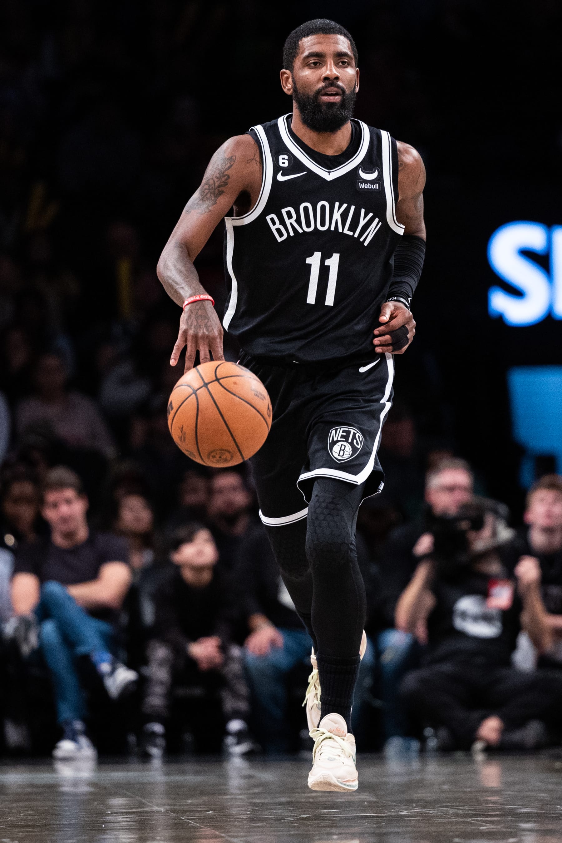NEW YORK, NEW YORK - NOVEMBER 01: Kyrie Irving #11 of the Brooklyn Nets brings the ball up the court during the fourth quarter of the game against the Chicago Bulls at Barclays Center on November 01, 2022 in New York City. NOTE TO USER: User expressly acknowledges and agrees that, by downloading and or using this photograph, User is consenting to the terms and conditions of the Getty Images License Agreement. (Photo by Dustin Satloff/Getty Images)