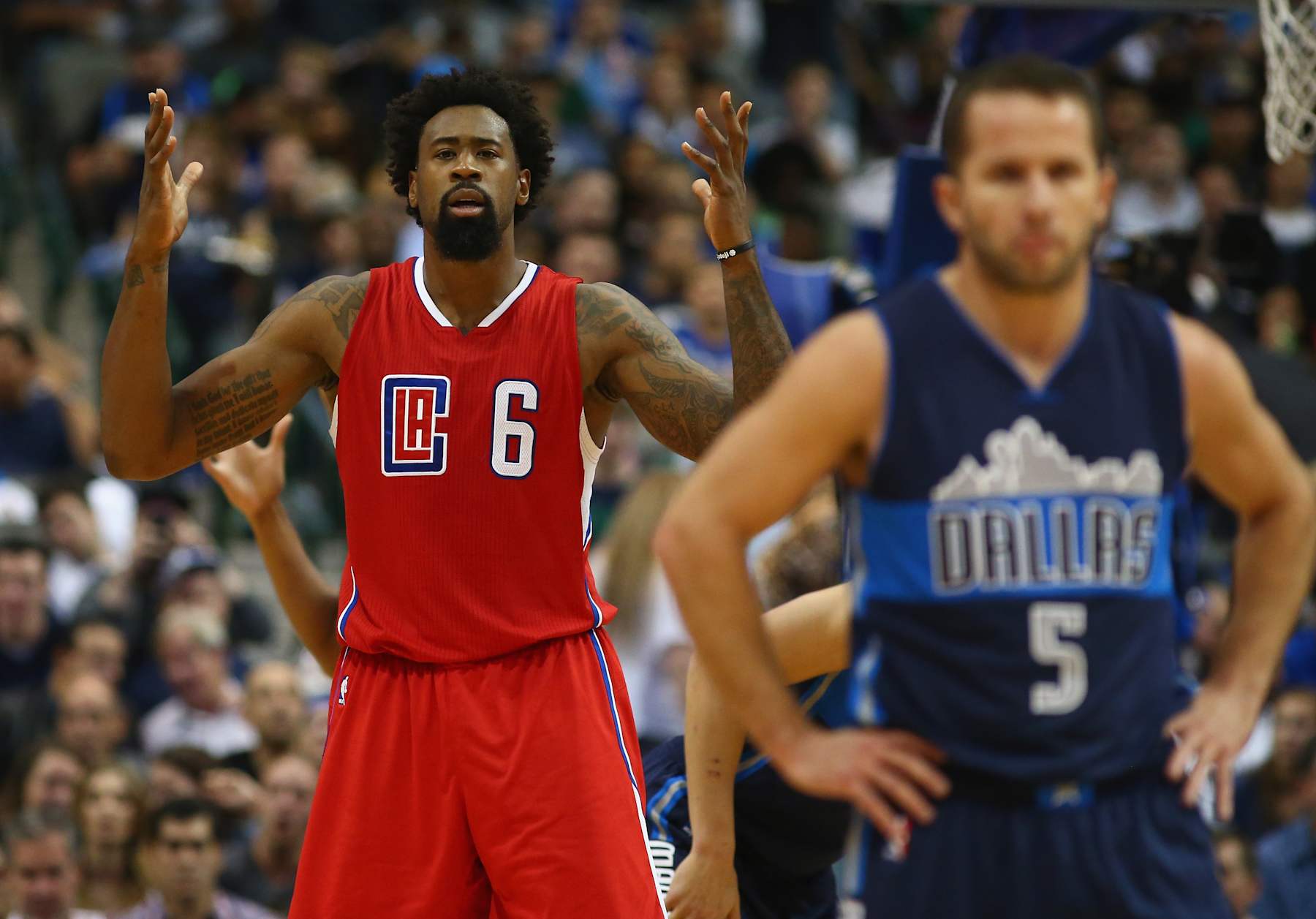 DALLAS, TX - NOVEMBER 11:  DeAndre Jordan #6 of the Los Angeles Clippers reacts during play against the Dallas Mavericks in the first half at American Airlines Center on November 11, 2015 in Dallas, Texas.  NOTE TO USER:  User expressly acknowledges and agrees that, by downloading and or using photograph, User is consenting to the terms and conditions of the Getty Images License Agreement.  (Photo by Ronald Martinez/Getty Images)