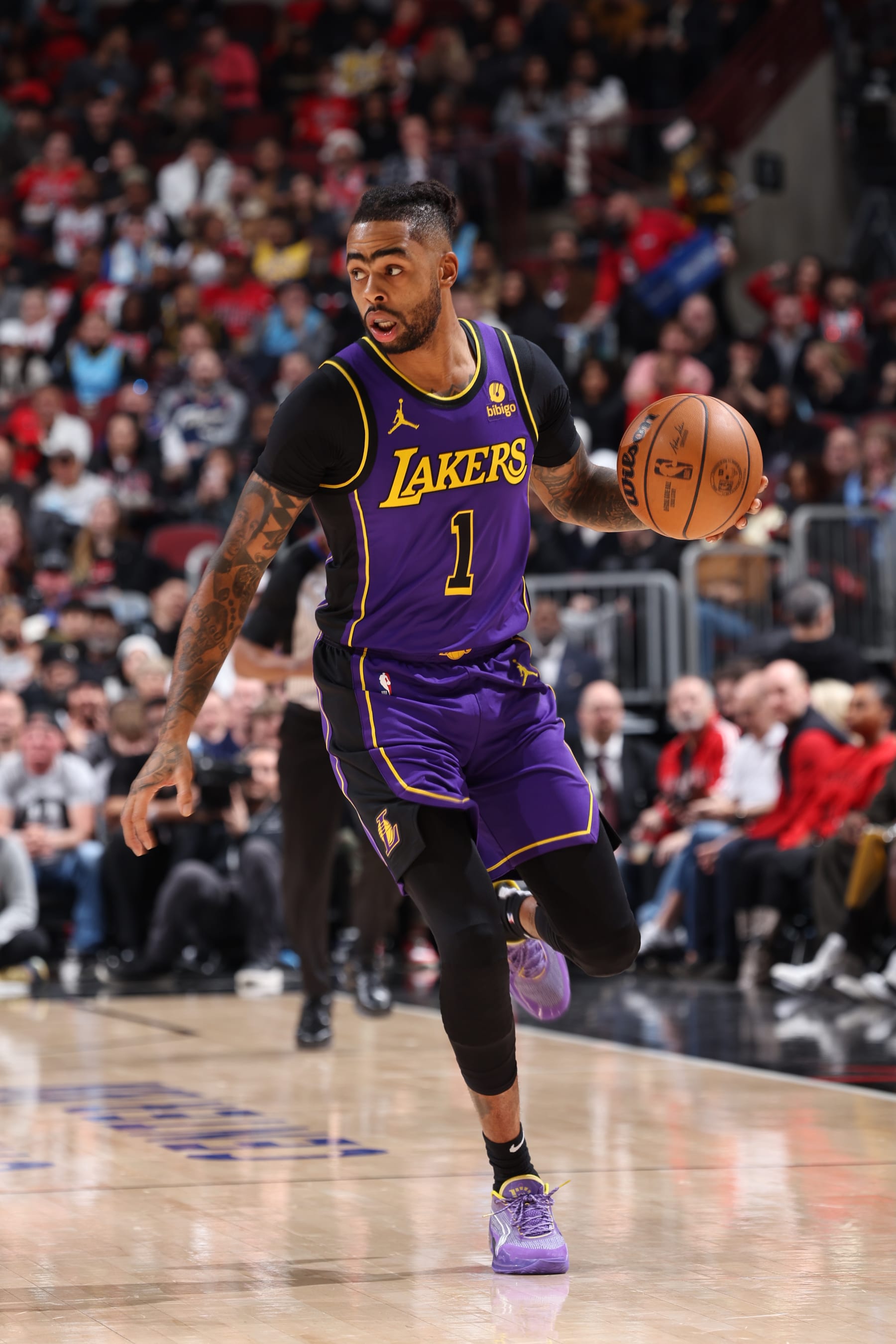 CHICAGO, IL - DECEMBER 20:  D'Angelo Russell #1 of the Los Angeles Lakers handles the ball during the game against the Chicago Bulls on December 20, 2023 at United Center in Chicago, Illinois. NOTE TO USER: User expressly acknowledges and agrees that, by downloading and or using this photograph, User is consenting to the terms and conditions of the Getty Images License Agreement. Mandatory Copyright Notice: Copyright 2023 NBAE (Photo by Jeff Haynes/NBAE via Getty Images)