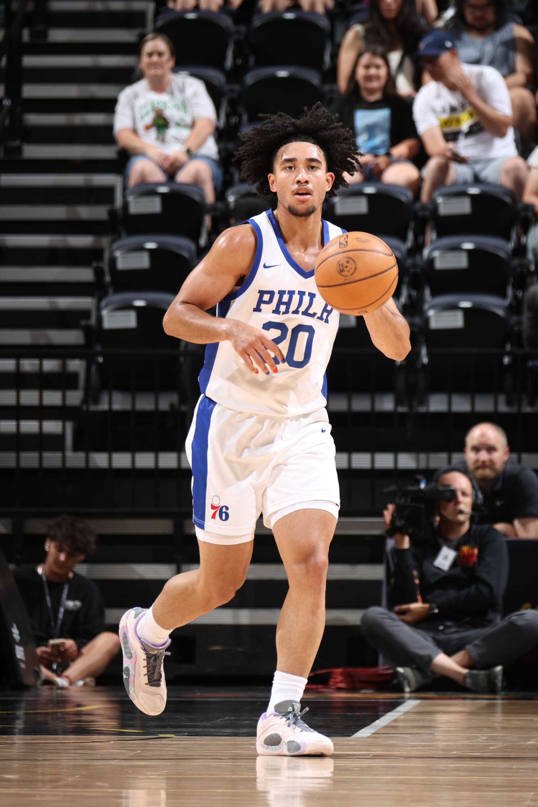 SALT LAKE CITY, UT - JULY 9: Jared McCain #20 of the Philadelphia 76ers handles the ball during the game against the Memphis Grizzlies during the 2024 NBA Salt Lake City Summer League on July 9, 2024 at Delta Center in Salt Lake City, Utah. NOTE TO USER: User expressly acknowledges and agrees that, by downloading and or using this Photograph, User is consenting to the terms and conditions of the Getty Images License Agreement. Mandatory Copyright Notice: Copyright 2024 NBAE (Photo by Melissa Majchrzak/NBAE via Getty Images)
