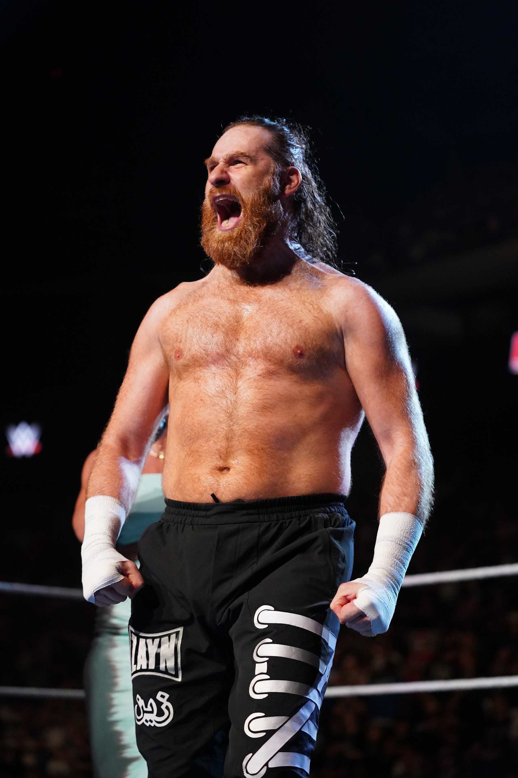 AUSTIN, TEXAS - AUGUST 12: Sami Zayn makes his entrance during Monday Night RAW at Moody Center on August 12, 2024 in Austin, Texas.  (Photo by WWE/Getty Images)