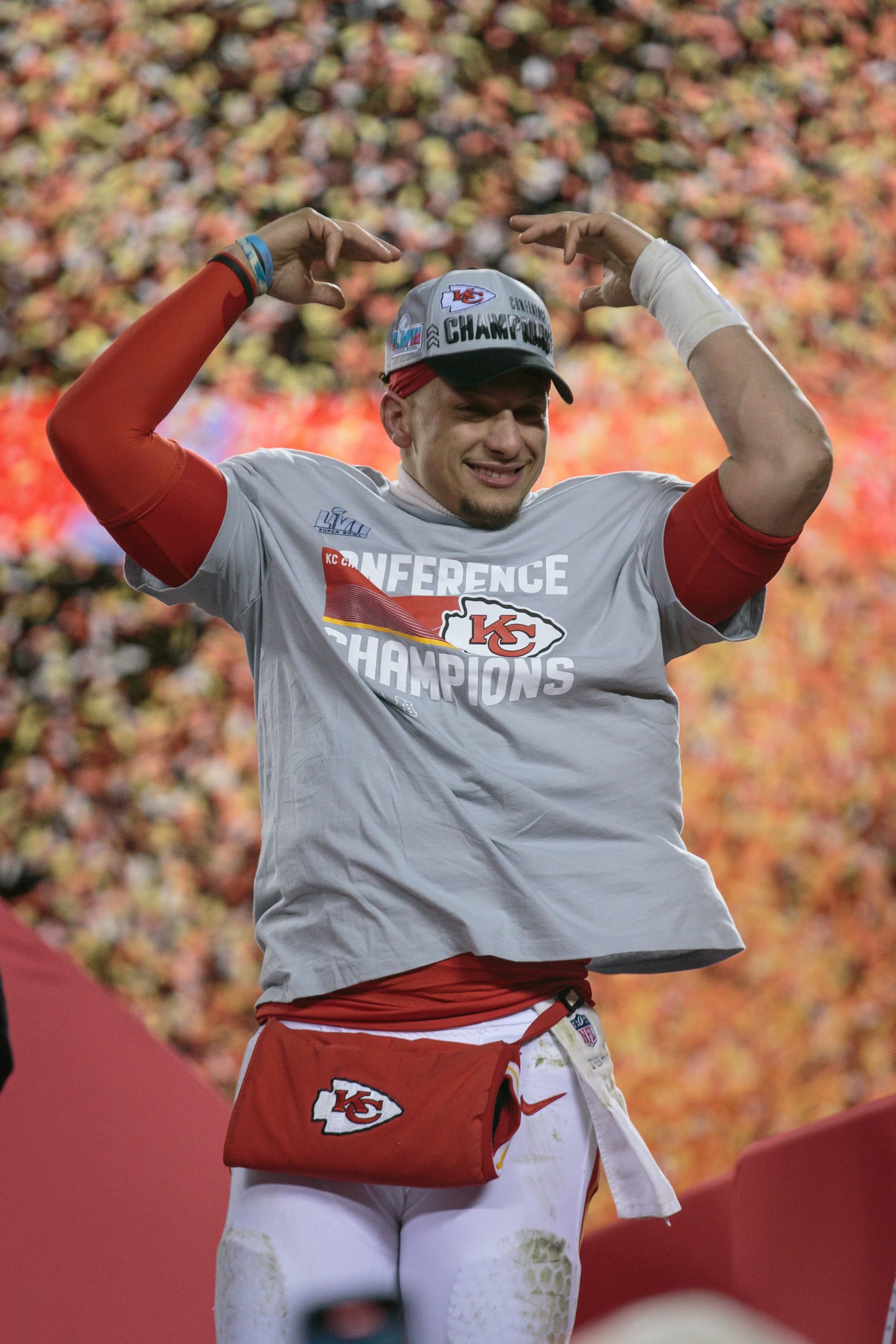 KANSAS CITY, MO - JANUARY 29: Kansas City Chiefs quarterback Patrick Mahomes (15) celebrates on the trophy podium after the game against the Cincinnati Bengals on January 29th, 2023 at Arrowhead Stadium in Kansas City, Missouri. (Photo by William Purnell/Icon Sportswire via Getty Images)