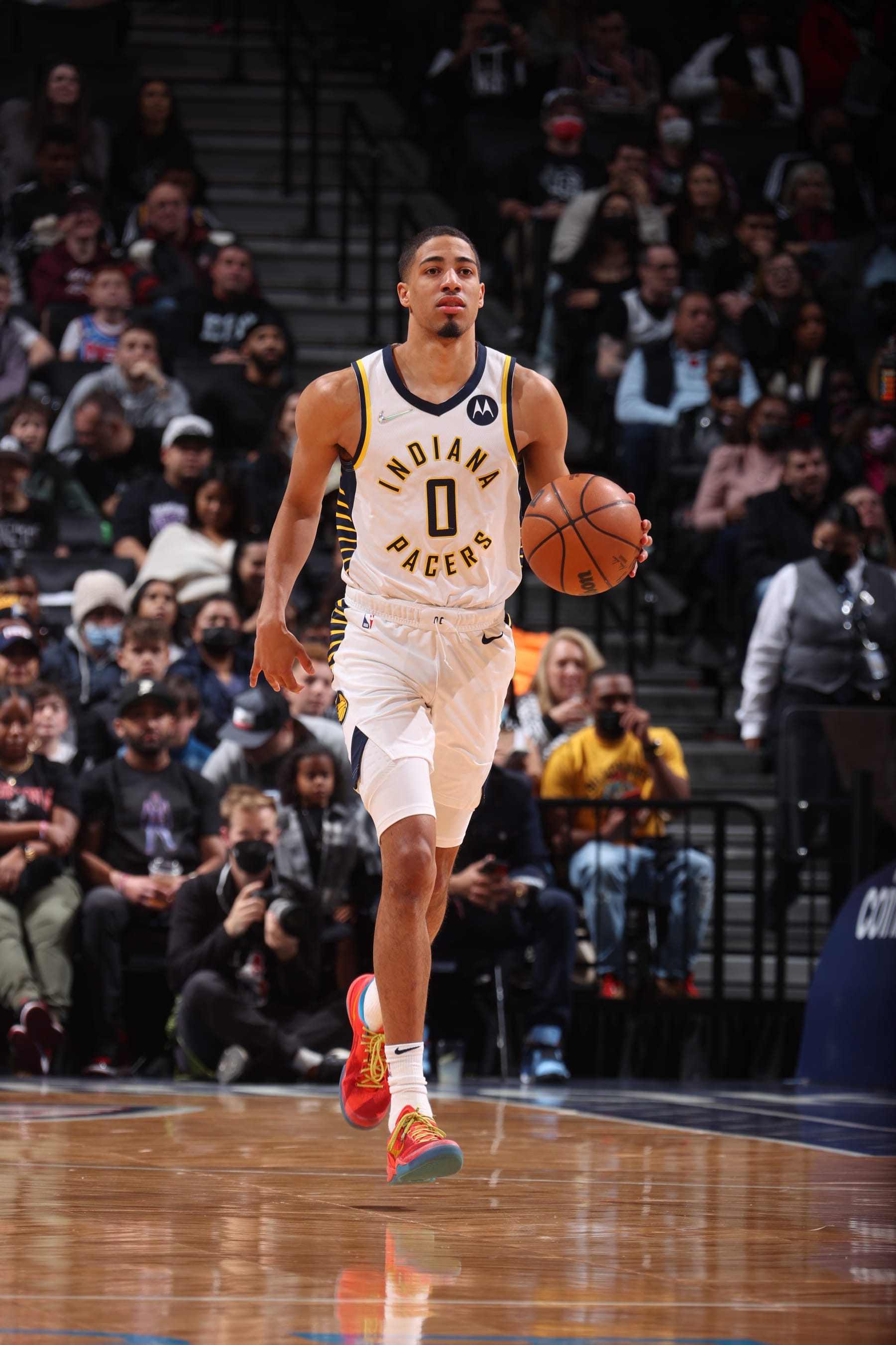 BROOKLYN, NY - APRIL 10: Tyrese Haliburton #0 of the Indiana Pacers dribbles the ball during the game against the Brooklyn Nets on April 10, 2022 at Barclays Center in Brooklyn, New York. NOTE TO USER: User expressly acknowledges and agrees that, by downloading and or using this Photograph, user is consenting to the terms and conditions of the Getty Images License Agreement. Mandatory Copyright Notice: Copyright 2022 NBAE (Photo by Nathaniel S. Butler/NBAE via Getty Images)