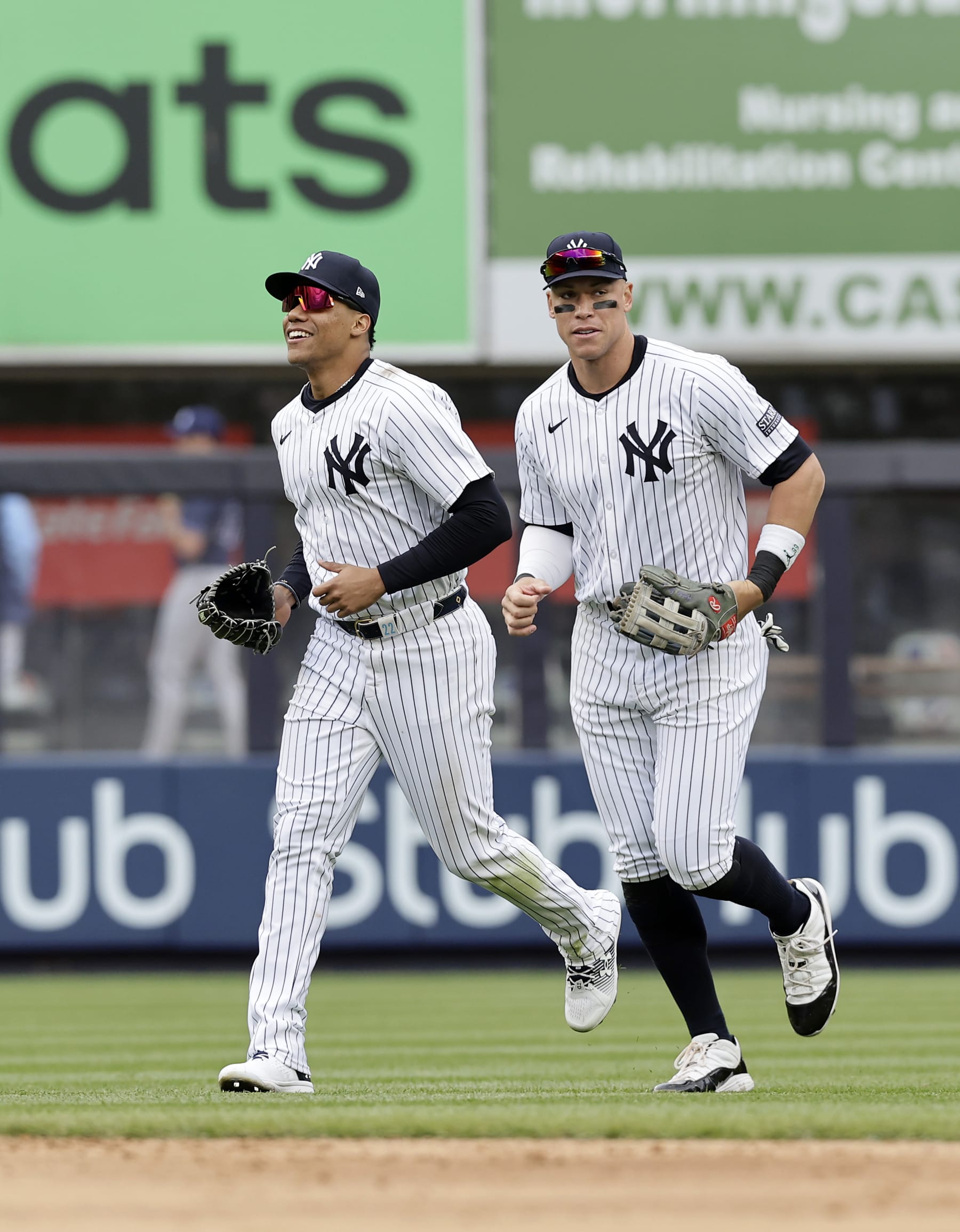 NEW YORK, NEW YORK - APRIL 21:  Juan Soto #22 (L) and Aaron Judge #99 of the New York Yankees celebrate after defeating the Tampa Bay Rays at Yankee Stadium on April 21, 2024 in New York City. (Photo by Jim McIsaac/Getty Images)