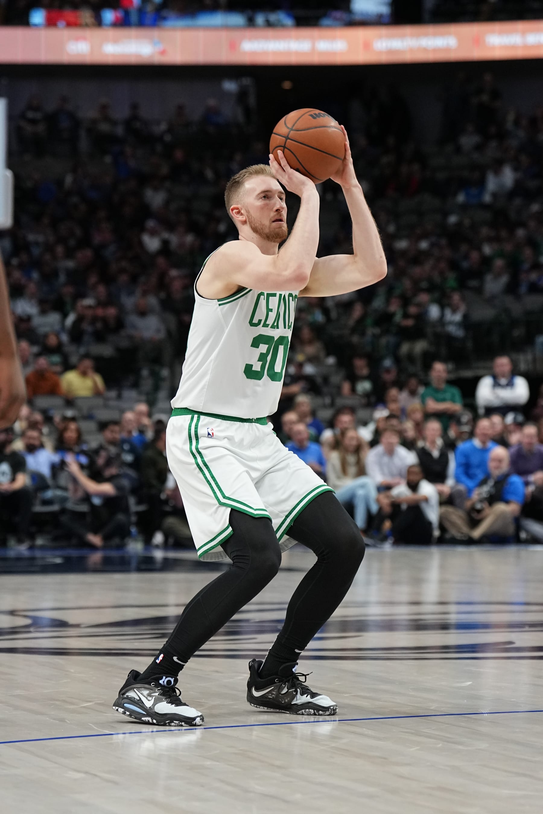 DALLAS, TX - JANUARY 5: Sam Hauser #30 of the Boston Celtics shoots the ball during the game against the Dallas Mavericks on January 5, 2022 at the American Airlines Center in Dallas, Texas. NOTE TO USER: User expressly acknowledges and agrees that, by downloading and or using this photograph, User is consenting to the terms and conditions of the Getty Images License Agreement. Mandatory Copyright Notice: Copyright 2023 NBAE (Photo by Glenn James/NBAE via Getty Images)