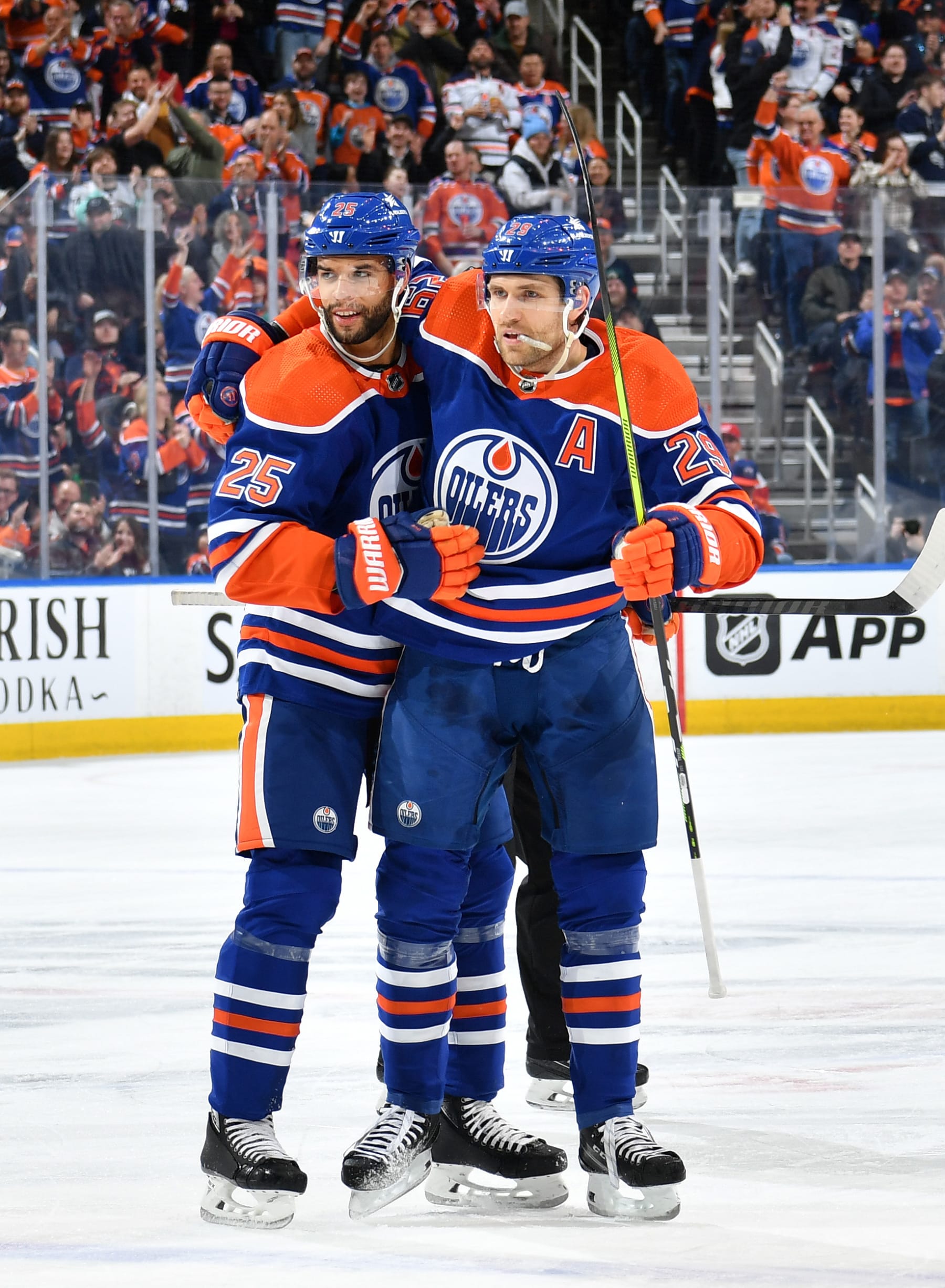 EDMONTON, CANADA - FEBRUARY 13: Leon Draisaitl #29 of the Edmonton Oilers celebrates after his first-period goal during the game against the Detroit Red Wings with Darnell Nurse #25 at Rogers Place on February 13, 2024, in Edmonton, Alberta, Canada. (Photo by Andy Devlin/NHLI via Getty Images)