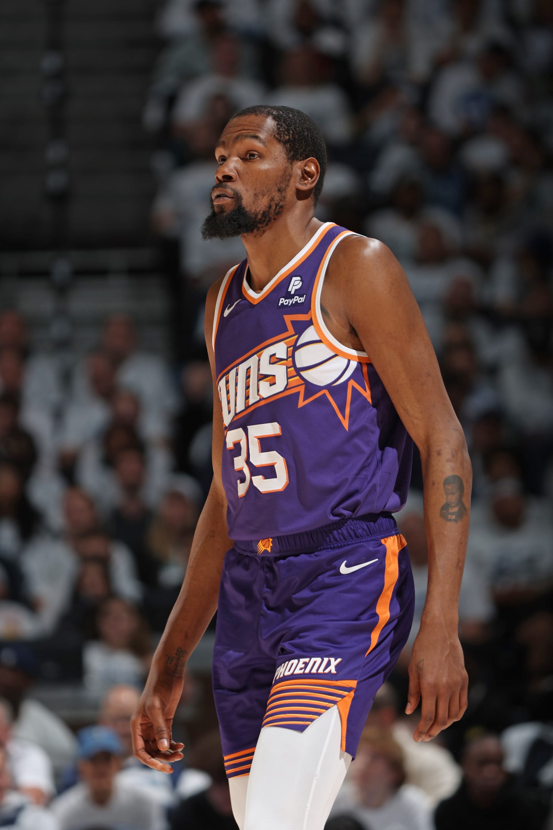 MINNEAPOLIS, MN -  APRIL 23: Kevin Durant #35 of the Phoenix Suns looks on during the game against the Minnesota Timberwolves during Round 1 Game 2 of the 2024 NBA Playoffs on April 23, 2024 at Target Center in Minneapolis, Minnesota. NOTE TO USER: User expressly acknowledges and agrees that, by downloading and or using this Photograph, user is consenting to the terms and conditions of the Getty Images License Agreement. Mandatory Copyright Notice: Copyright 2024 NBAE (Photo by David Sherman/NBAE via Getty Images)