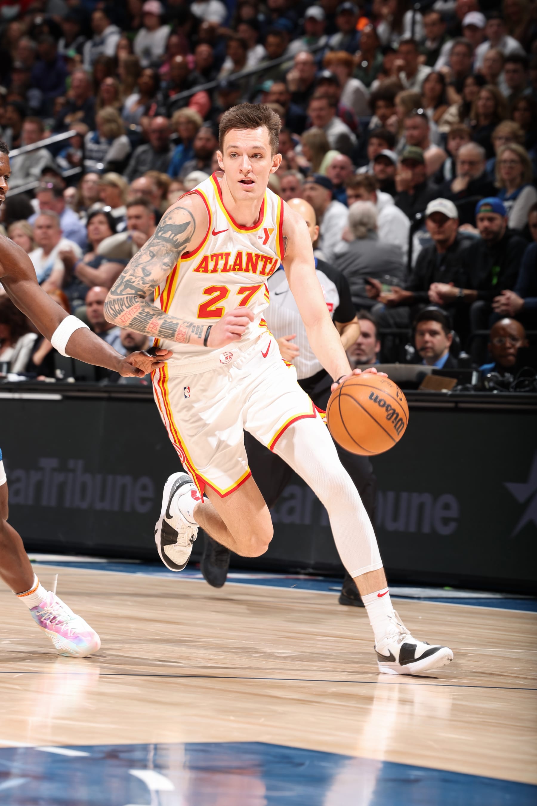 MINNEAPOLIS, MN -  APRIL 12:  Vit Krejci #27 of the Atlanta Hawks handles the ball during the game against the Minnesota Timberwolves on April 12, 2024 at Target Center in Minneapolis, Minnesota. NOTE TO USER: User expressly acknowledges and agrees that, by downloading and or using this Photograph, user is consenting to the terms and conditions of the Getty Images License Agreement. Mandatory Copyright Notice: Copyright 2024 NBAE (Photo by David Sherman/NBAE via Getty Images)
