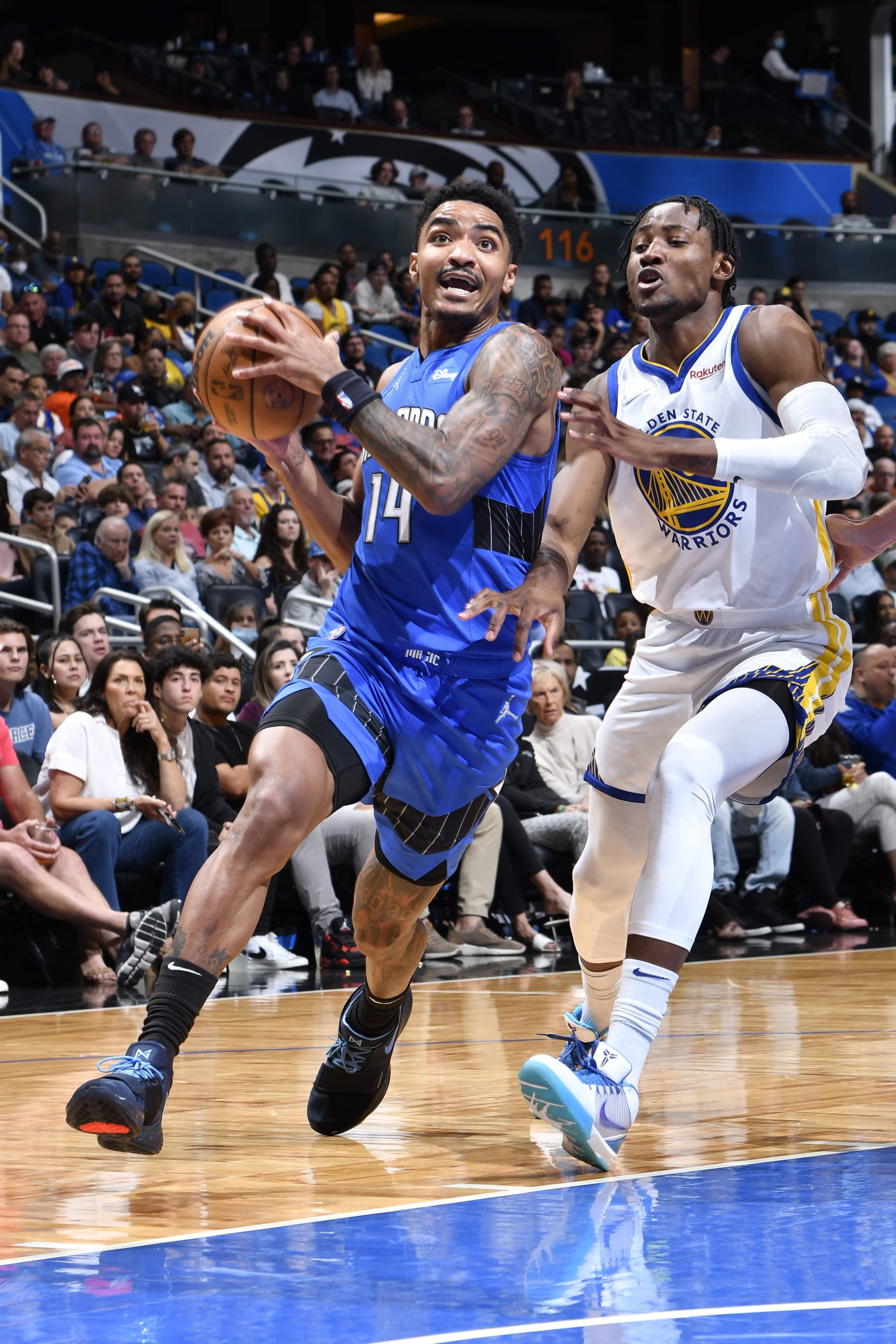 ORLANDO, FL - MARCH 22: Gary Harris #14 of the Orlando Magic drives to the basket during the game against the Golden State Warriors on March 22, 2022 at Amway Center in Orlando, Florida. NOTE TO USER: User expressly acknowledges and agrees that, by downloading and or using this photograph, User is consenting to the terms and conditions of the Getty Images License Agreement. Mandatory Copyright Notice: Copyright 2022 NBAE (Photo by Fernando Medina/NBAE via Getty Images)