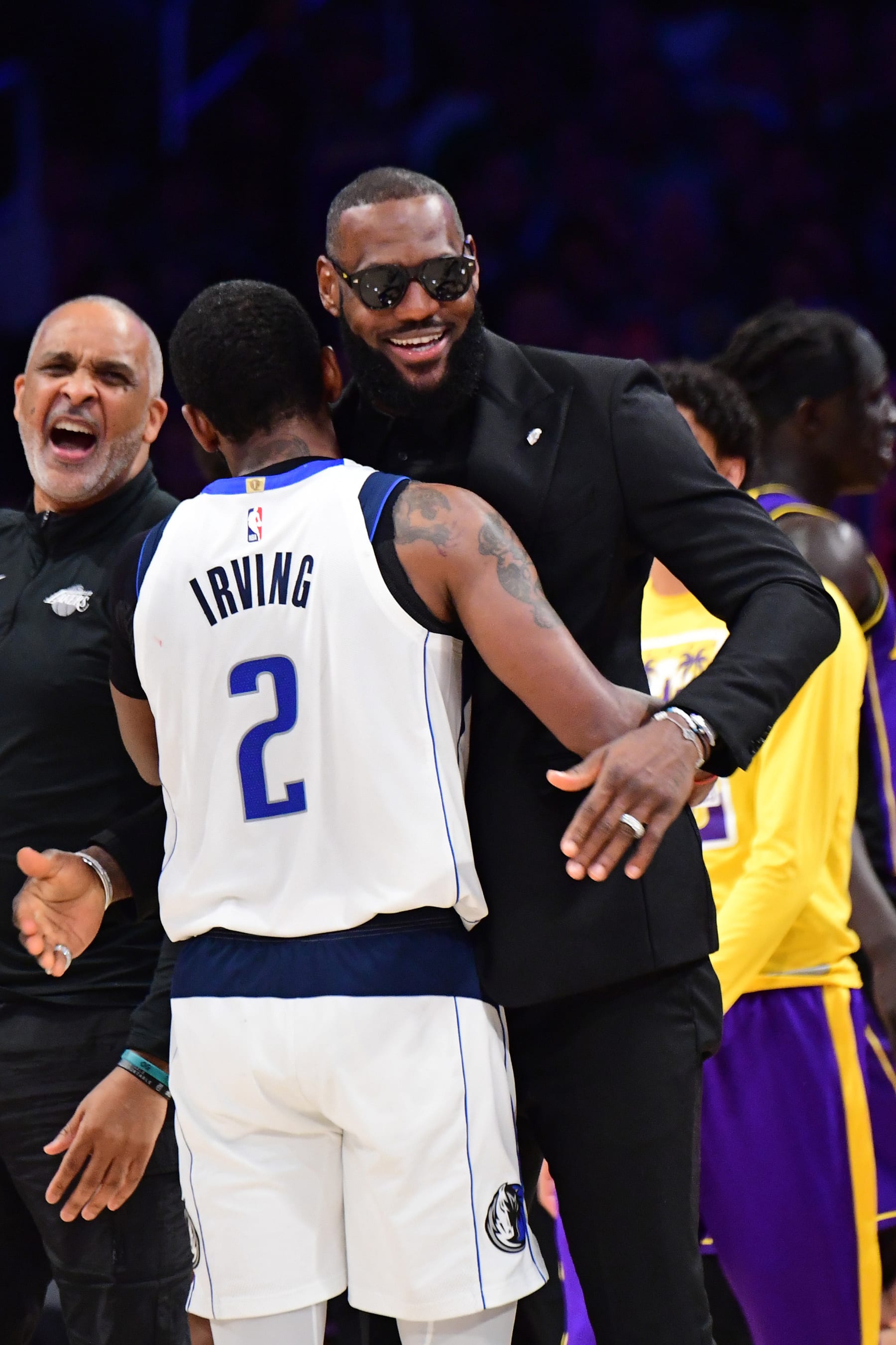 LOS ANGELES, CA -MARCH 17: LeBron James #6 of the Los Angeles Lakers hugs Kyrie Irving #2 of the Dallas Mavericks after the game against the Dallas Mavericks on March 17, 2023 at Crypto.Com Arena in Los Angeles, California. NOTE TO USER: User expressly acknowledges and agrees that, by downloading and/or using this Photograph, user is consenting to the terms and conditions of the Getty Images License Agreement. Mandatory Copyright Notice: Copyright 2023 NBAE (Photo by Adam Pantozzi/NBAE via Getty Images)