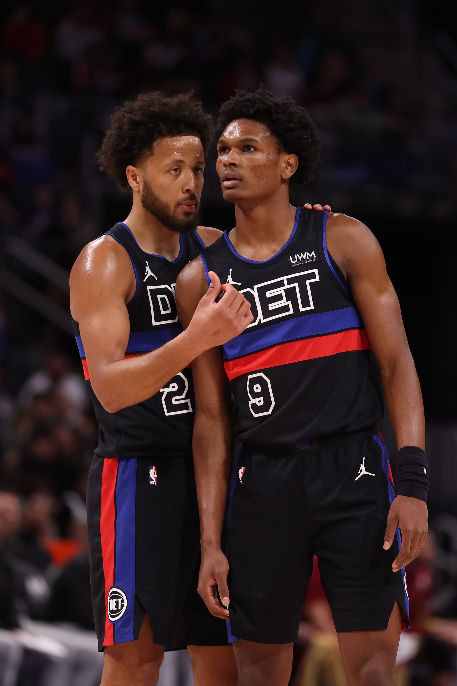 DETROIT, MICHIGAN - MARCH 01: Cade Cunningham #2 talks with Ausar Thompson #9 of the Detroit Pistons while playing the Cleveland Cavaliers at Little Caesars Arena on March 01, 2024 in Detroit, Michigan. NOTE TO USER: User expressly acknowledges and agrees that, by downloading and or using this photograph, User is consenting to the terms and conditions of the Getty Images License.  (Photo by Gregory Shamus/Getty Images)