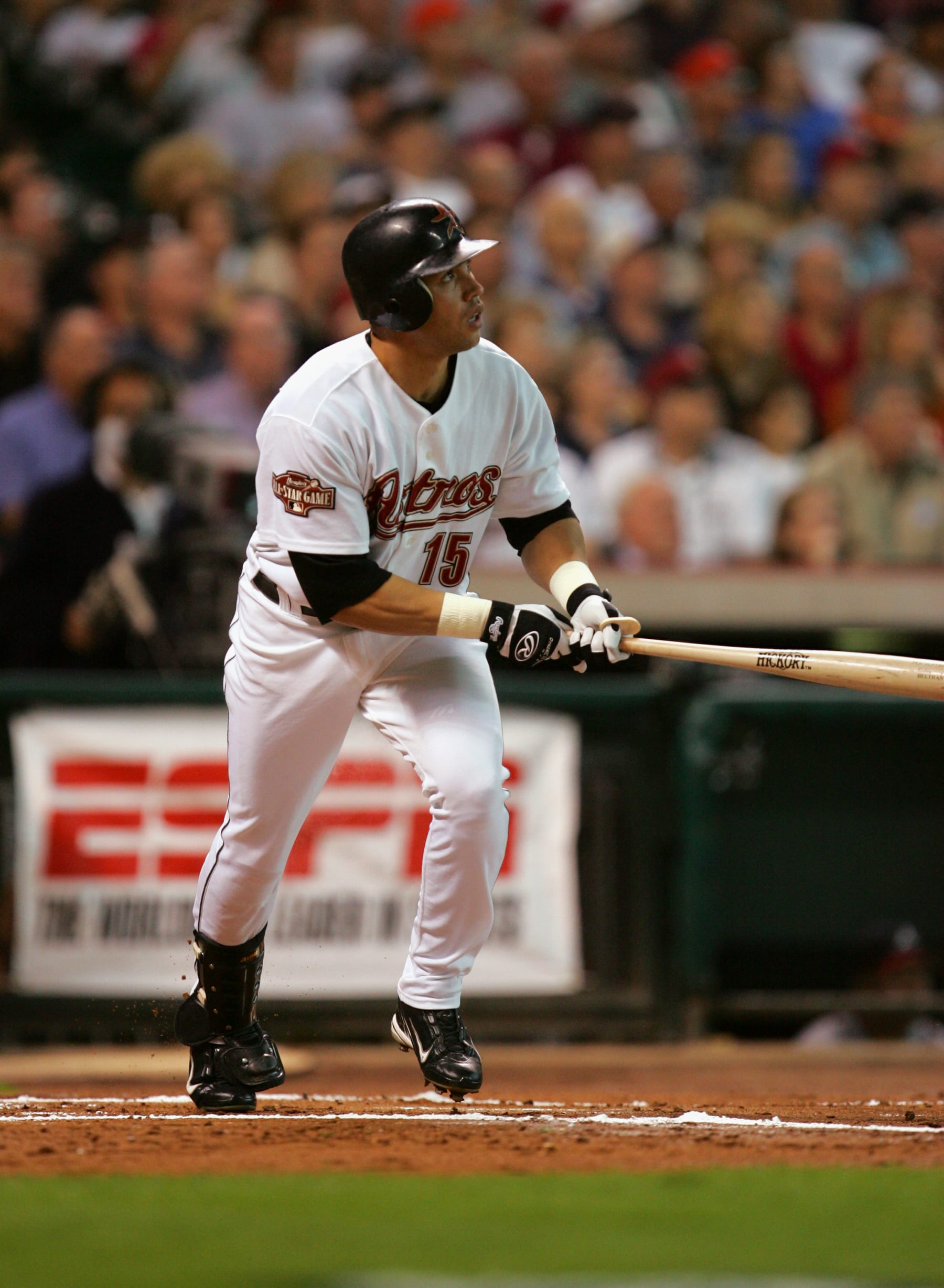 HOUSTON - OCTOBER 9:  Center fielder Carlos Beltran #15 of the Houston Astros connects with an Atlanta Braves pitch during game three of the National League Division Series on October 9, 2004 at Minute Maid Park in Houston, Texas.  The Astros won 8-5.  (Photo by Ronald Martinez/Getty Images)