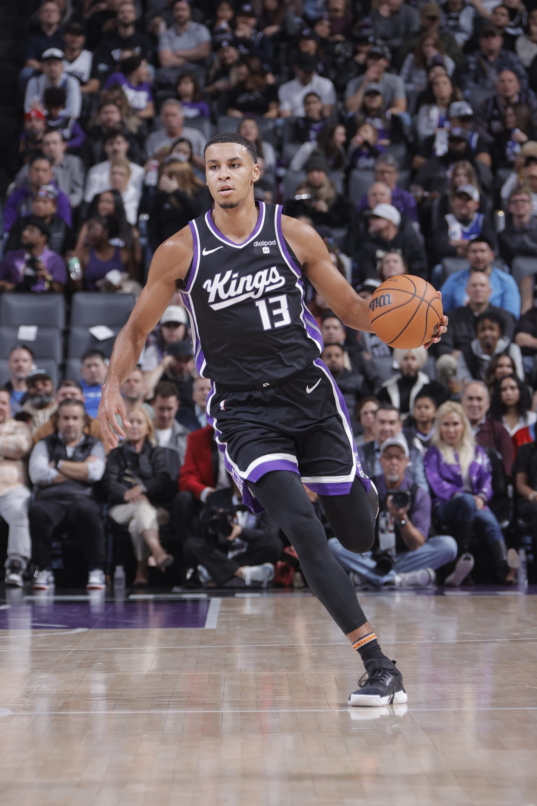 SACRAMENTO, CA - DECEMBER 18: Keegan Murray #13 of the Sacramento Kings dribbles the ball during the game against the Washington Wizards on December 18, 2023 at Golden 1 Center in Sacramento, California. NOTE TO USER: User expressly acknowledges and agrees that, by downloading and or using this Photograph, user is consenting to the terms and conditions of the Getty Images License Agreement. Mandatory Copyright Notice: Copyright 2023 NBAE (Photo by Rocky Widner/NBAE via Getty Images)