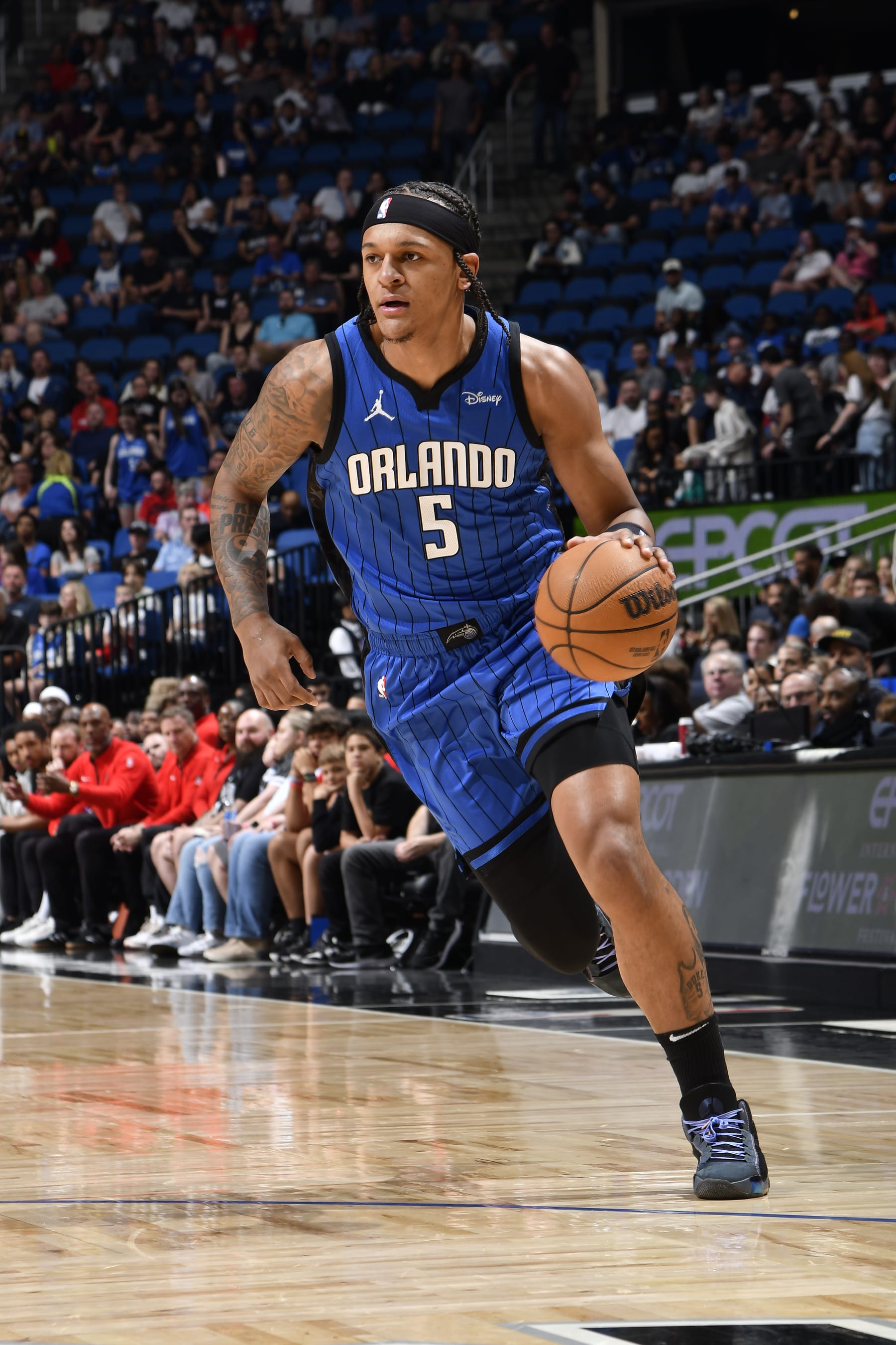 ORLANDO, FL - APRIL 1: Paolo Banchero #5 of the Orlando Magic handles the ball during the game again the Portland Trail Blazers on April 1, 2024 at Kia Center in Orlando, Florida. NOTE TO USER: User expressly acknowledges and agrees that, by downloading and or using this photograph, User is consenting to the terms and conditions of the Getty Images License Agreement. Mandatory Copyright Notice: Copyright 2024 NBAE (Photo by Fernando Medina/NBAE via Getty Images)