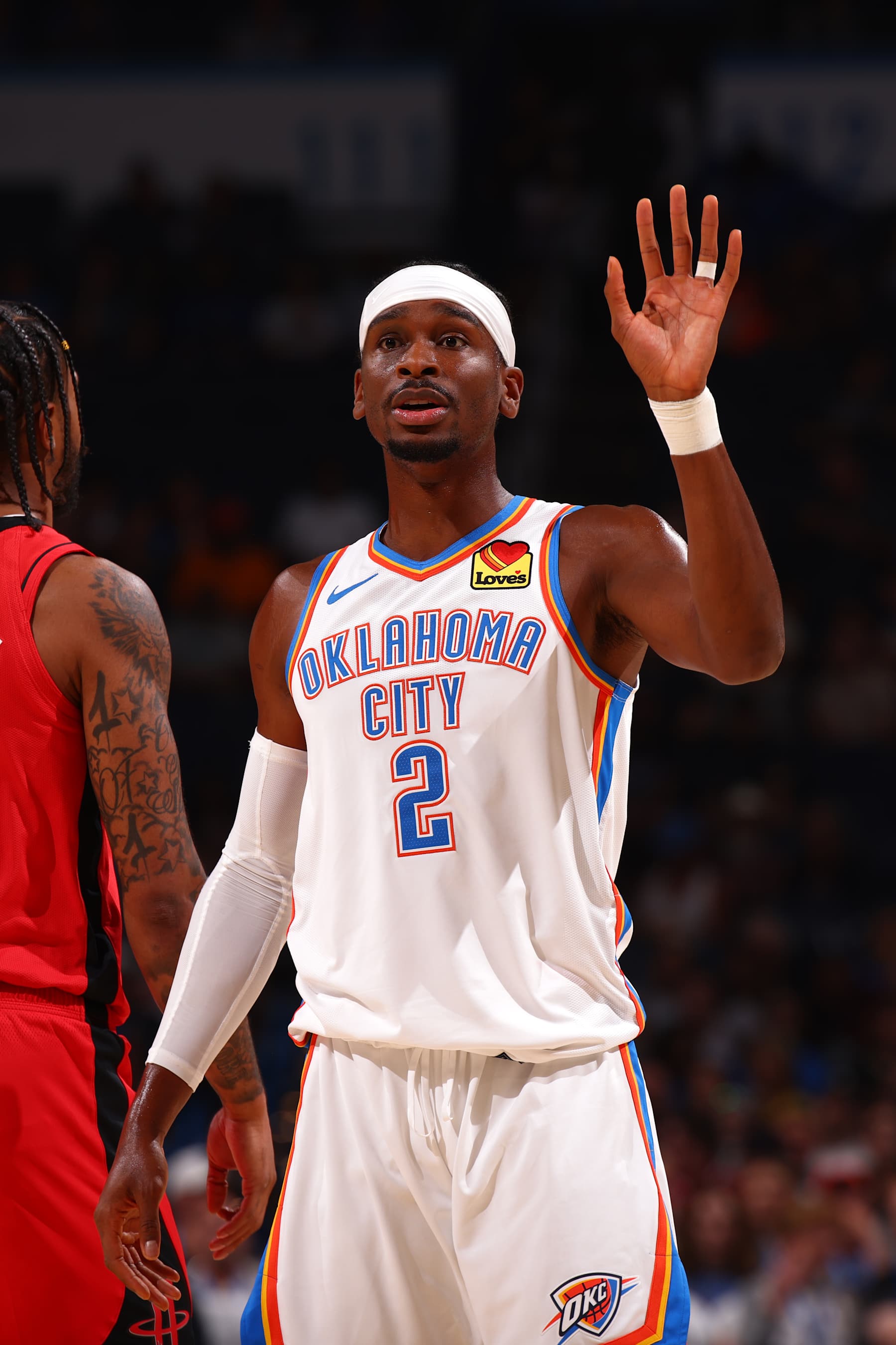 OKLAHOMA CITY, OK - OCTOBER 9: Shai Gilgeous-Alexander #2 of the Oklahoma City Thunder looks on during the game against the Houston Rockets during a NBA pre season game on October 9, 2024 at Paycom Center in Oklahoma City, Oklahoma. NOTE TO USER: User expressly acknowledges and agrees that, by downloading and or using this photograph, User is consenting to the terms and conditions of the Getty Images License Agreement. Mandatory Copyright Notice: Copyright 2024 NBAE (Photo by Zach Beeker/NBAE via Getty Images)