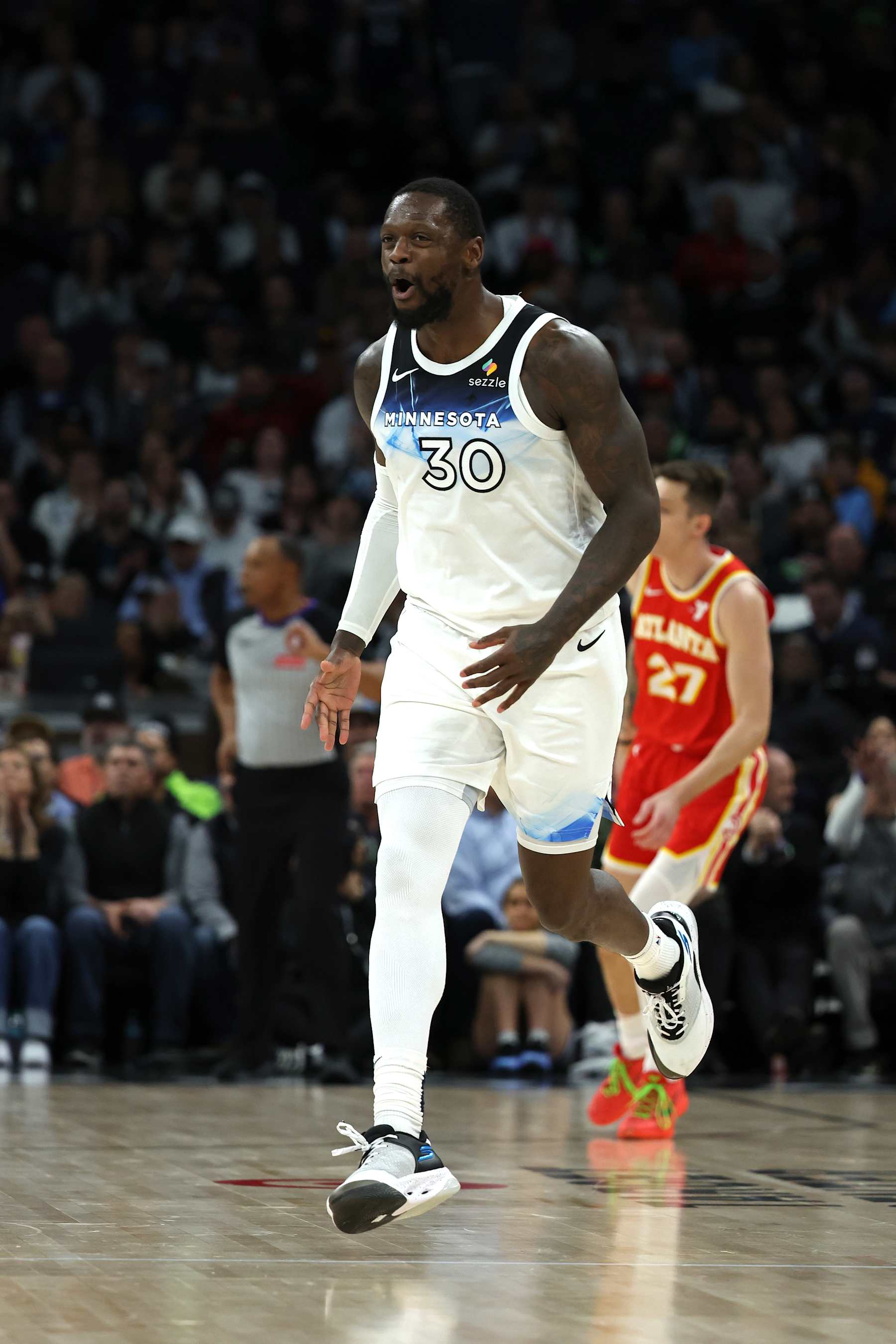 MINNEAPOLIS, MN -  JANUARY 27: Julius Randle #30 of the Minnesota Timberwolves celebrates during the game against the Atlanta Hawks on January 27, 2025 at Target Center in Minneapolis, Minnesota. NOTE TO USER: User expressly acknowledges and agrees that, by downloading and or using this Photograph, user is consenting to the terms and conditions of the Getty Images License Agreement. Mandatory Copyright Notice: Copyright 2025 NBAE (Photo by Ellen Schmidt/NBAE via Getty Images)