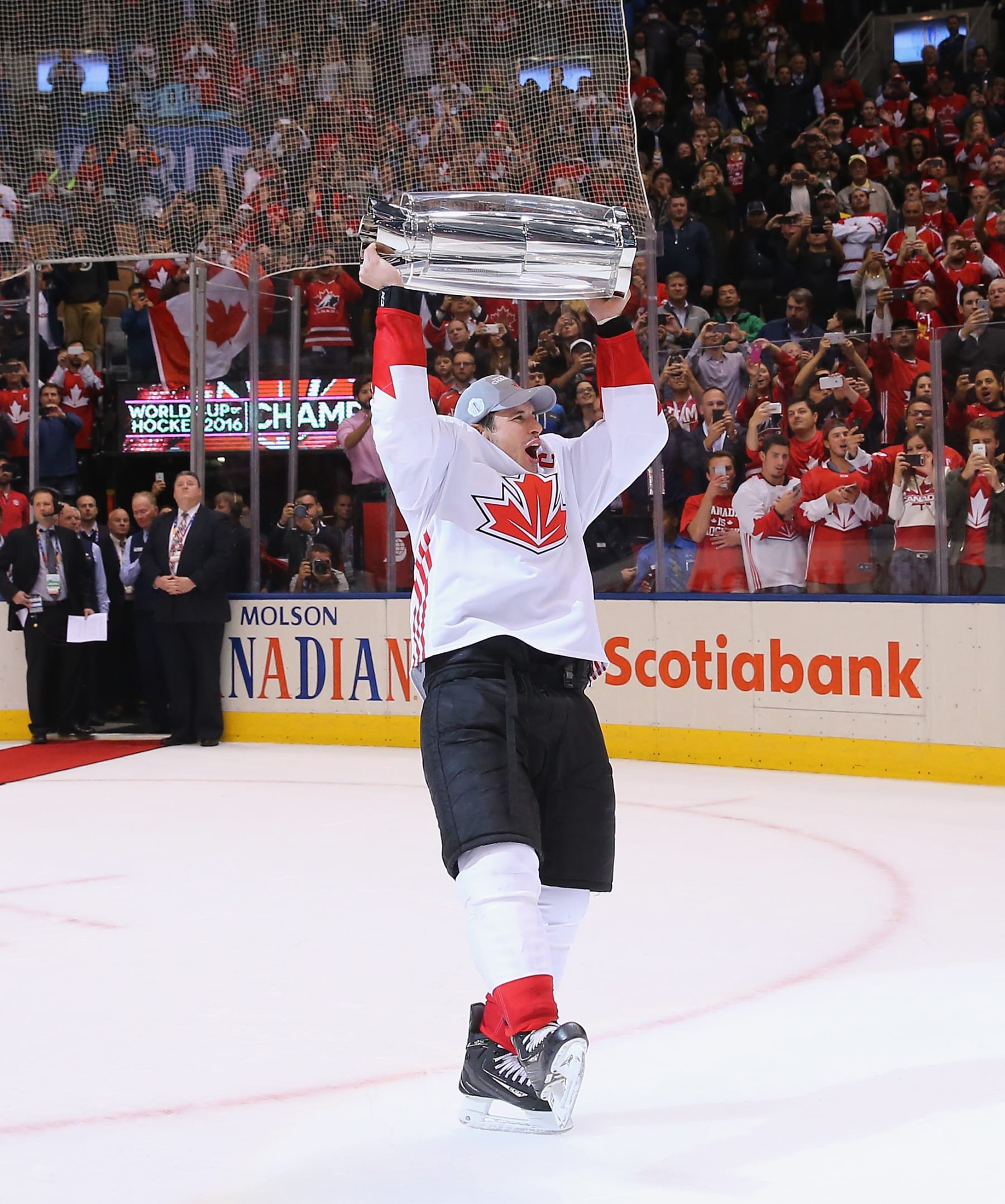TORONTO, ON - SEPTEMBER 29:  Sidney Crosby #87 of Team Canada carries the World Cup of Hockey Trophy after Canada defeated Europe 2-1 during Game Two of the World Cup of Hockey final series at the Air Canada Centre on September 29, 2016 in Toronto, Canada.  (Photo by Bruce Bennett/Getty Images)