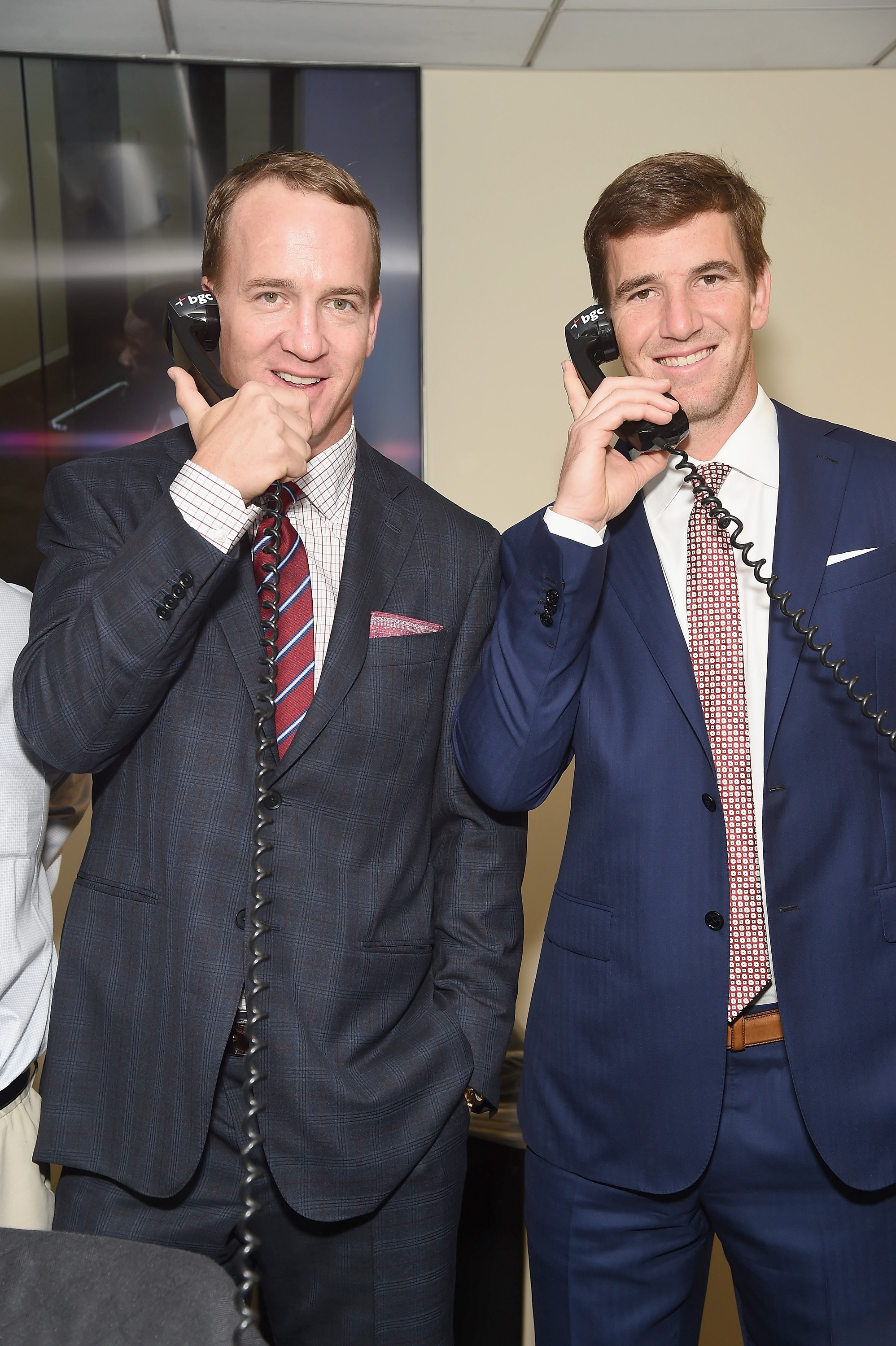 NEW YORK, NY - SEPTEMBER 12: Peyton Manning (L) and Eli Manning attend Annual Charity Day hosted by Cantor Fitzgerald, BGC and GFI at BGC Partners, INC on September 12, 2016 in New York City.  (Photo by Gary Gershoff/Getty Images for Cantor Fitzgerald)