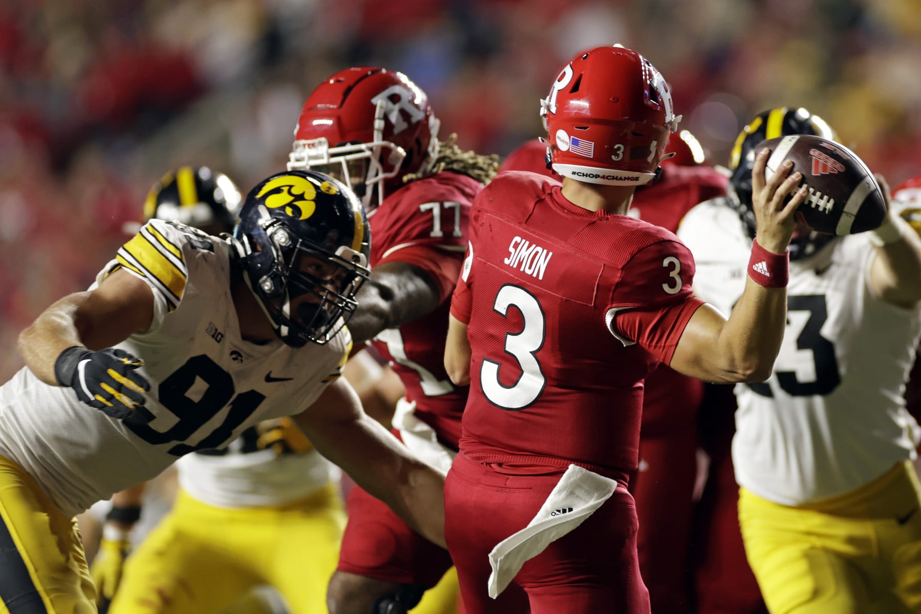 Iowa defensive lineman Lukas Van Ness (91) rushes Rutgers quarterback Evan Simon (3) during an NCAA football game on Saturday, Sept. 24, 2022, in Piscataway, N.J. (AP Photo/Adam Hunger)