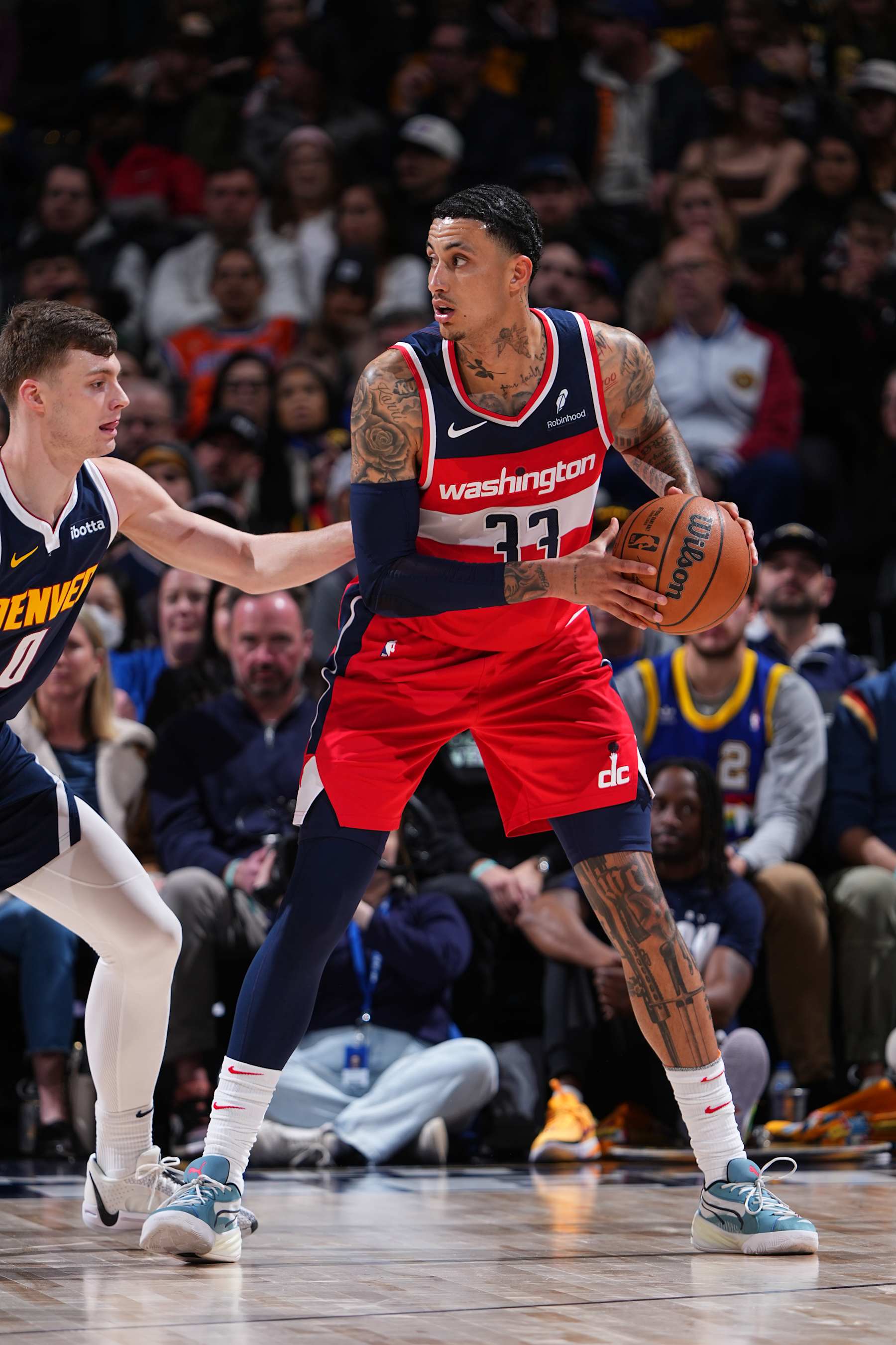 DENVER, CO - FEBRUARY 22: Kyle Kuzma #33 of the Washington Wizards handles the ball during the game against the Denver Nuggets on February 22, 2024 at the Ball Arena in Denver, Colorado. NOTE TO USER: User expressly acknowledges and agrees that, by downloading and/or using this Photograph, user is consenting to the terms and conditions of the Getty Images License Agreement. Mandatory Copyright Notice: Copyright 2024 NBAE (Photo by Garrett Ellwood/NBAE via Getty Images)