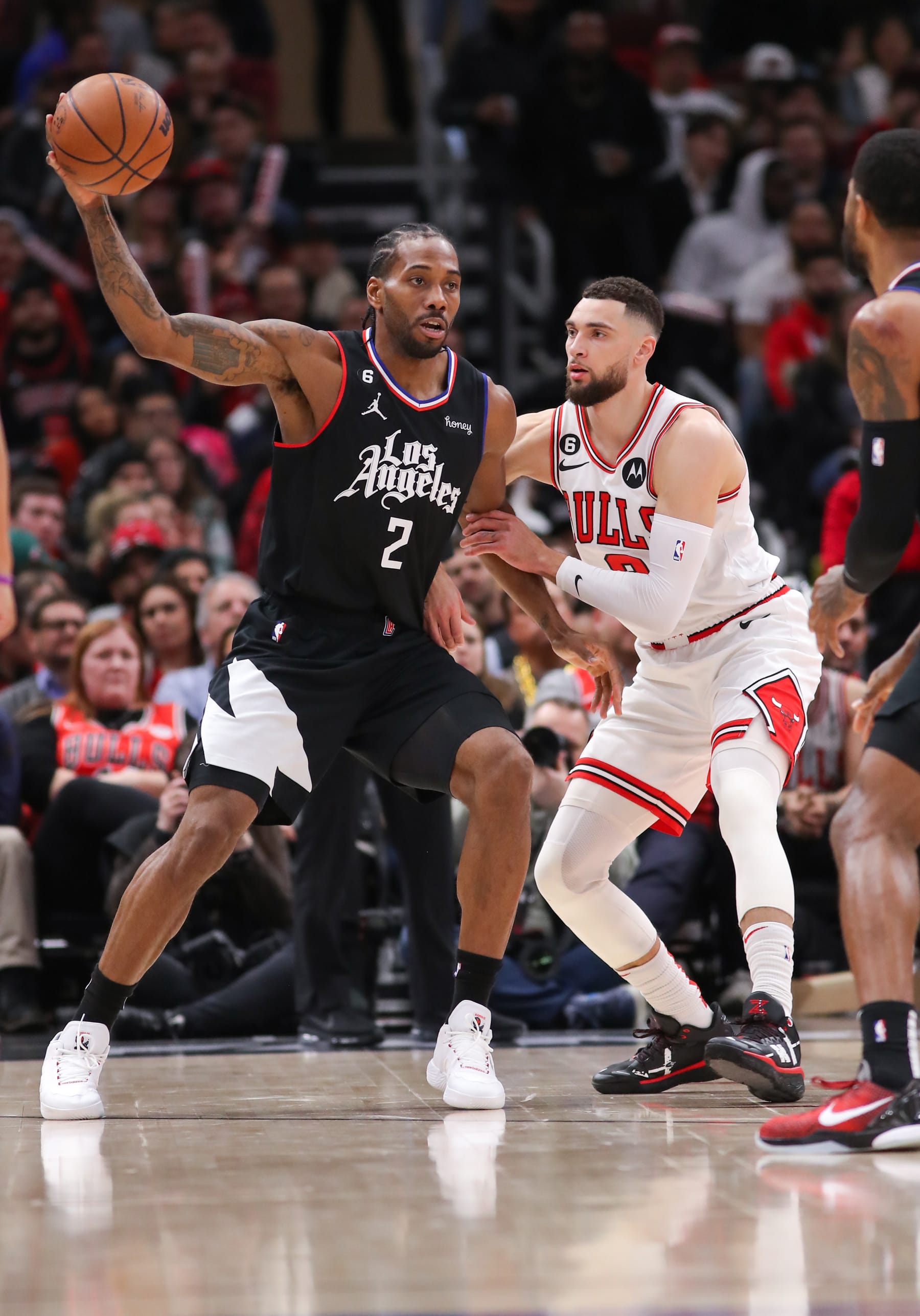 CHICAGO, IL - JANUARY 31: Chicago Bulls Guard Zach LaVine (8) posts up against Los Angeles Clippers Forward Kawhi Leonard (2) during a NBA game between the Los Angeles  Clippers and the Chicago Bulls on January 31, 2023 at the United Center in Chicago, IL. (Photo by Melissa Tamez/Icon Sportswire via Getty Images)