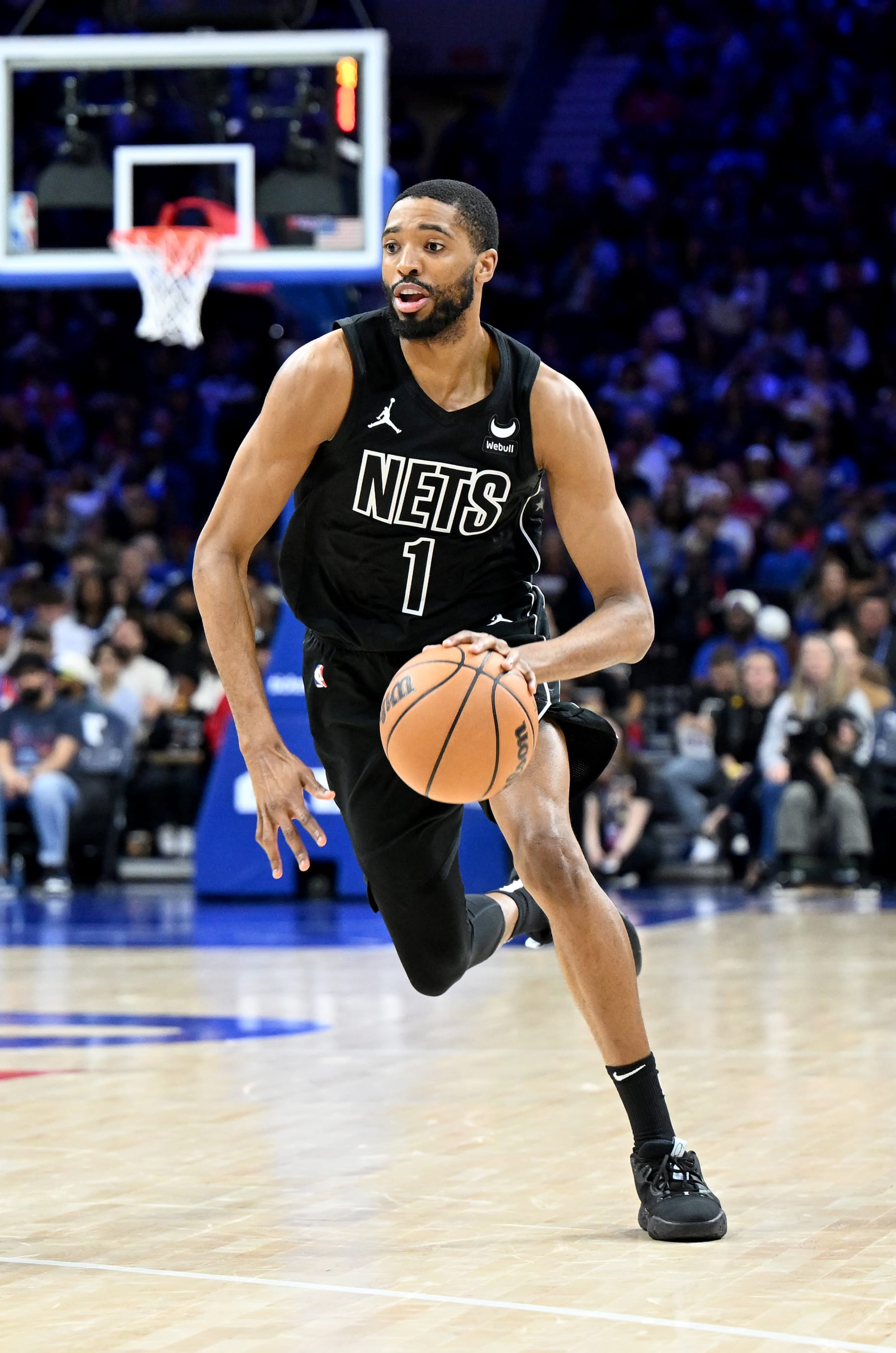 PHILADELPHIA, PENNSYLVANIA - APRIL 14: Mikal Bridges #1 of the Brooklyn Nets handles the ball against the Philadelphia 76ers at the Wells Fargo Center on April 14, 2024 in Philadelphia, Pennsylvania.  NOTE TO USER: User expressly acknowledges and agrees that, by downloading and or using this photograph, User is consenting to the terms and conditions of the Getty Images License Agreement. (Photo by G Fiume/Getty Images)