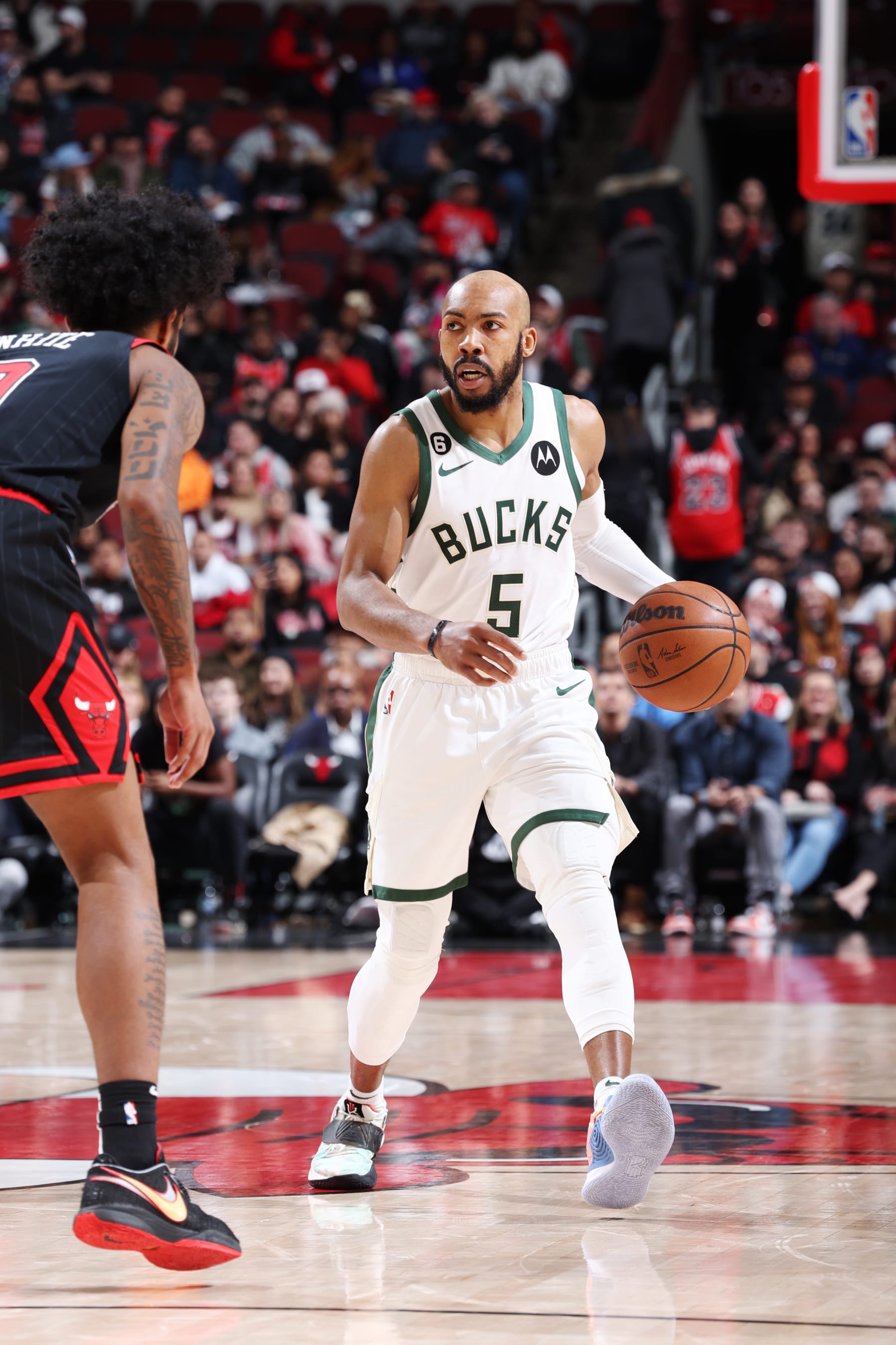 CHICAGO, IL - FEBRUARY 16: Jevon Carter #5 of the Milwaukee Bucks dribbles the ball during the game against the Chicago Bulls on February 16, 2023 at United Center in Chicago, Illinois. NOTE TO USER: User expressly acknowledges and agrees that, by downloading and or using this photograph, User is consenting to the terms and conditions of the Getty Images License Agreement. Mandatory Copyright Notice: Copyright 2023 NBAE (Photo by Jeff Haynes/NBAE via Getty Images)